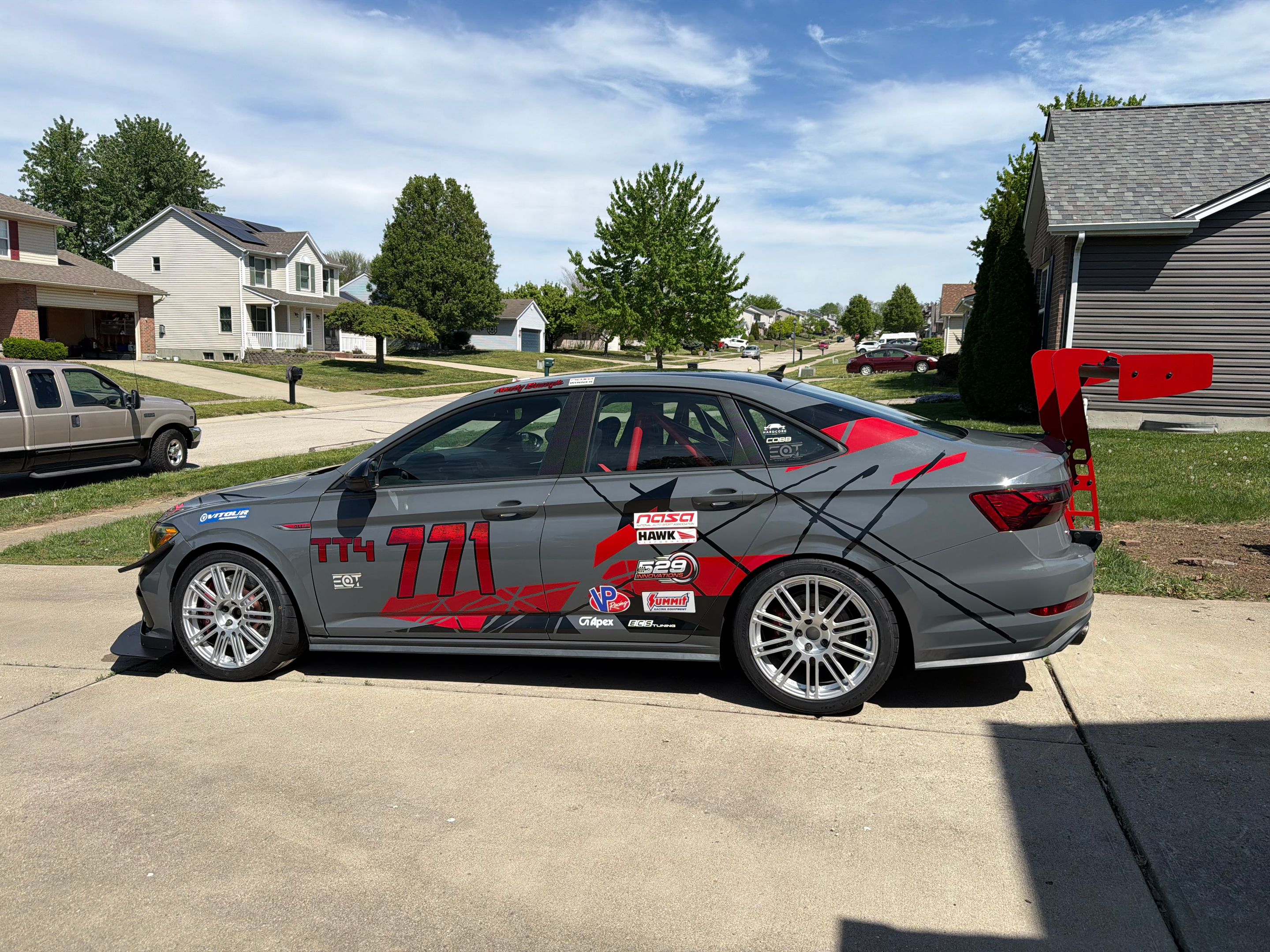 Race Livery VW MK7 GLI with 18" TC-10RT Apex wheels in Race Silver
