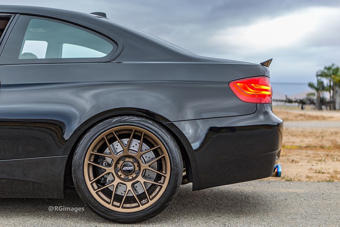 Black BMW E92 Coupe M3 with 18" ARC-8 Apex wheels in Satin Bronze