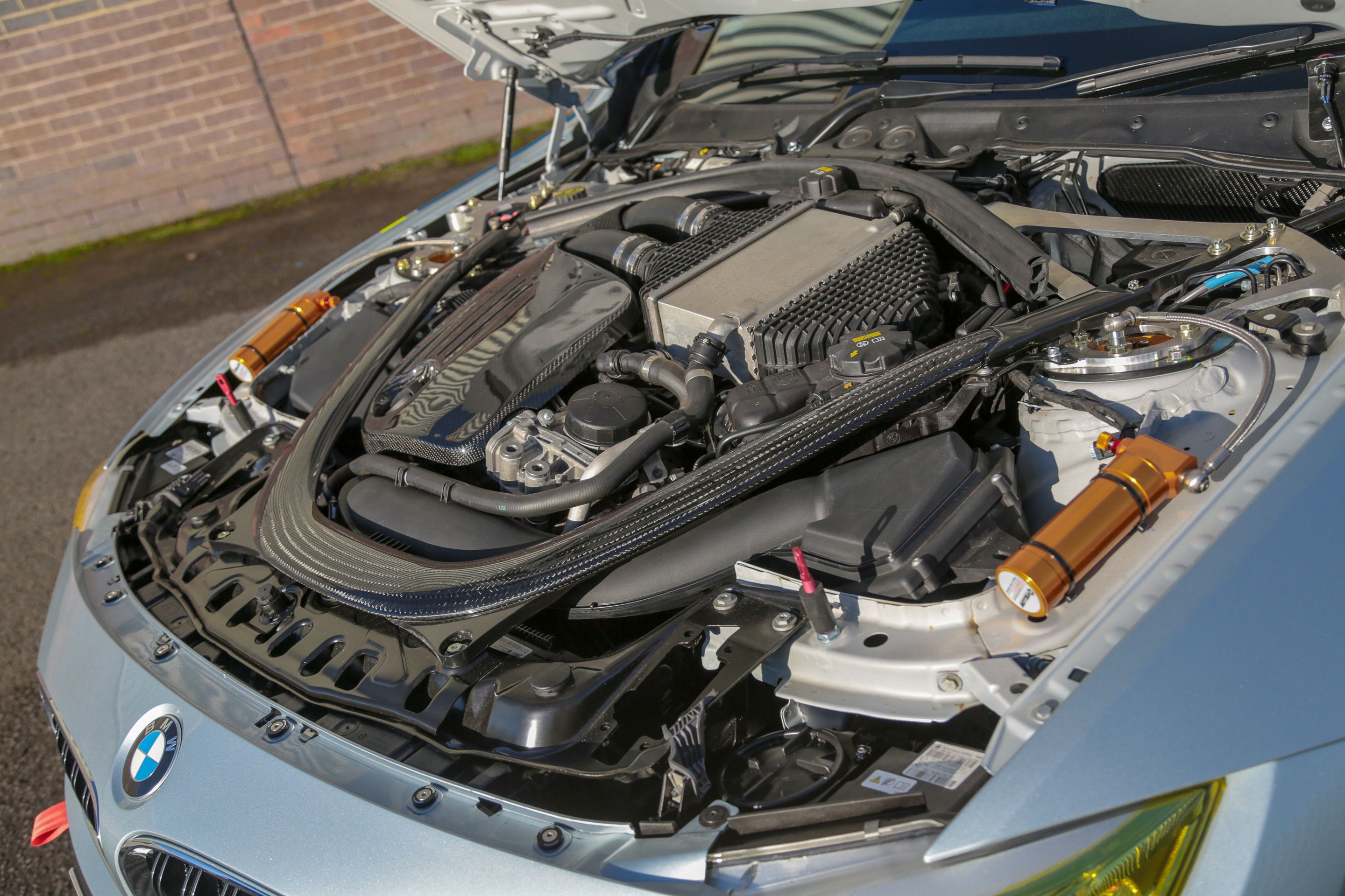 Multicolor BMW F82 Coupe M4 with 18" SM-10 Apex wheels in Satin Black