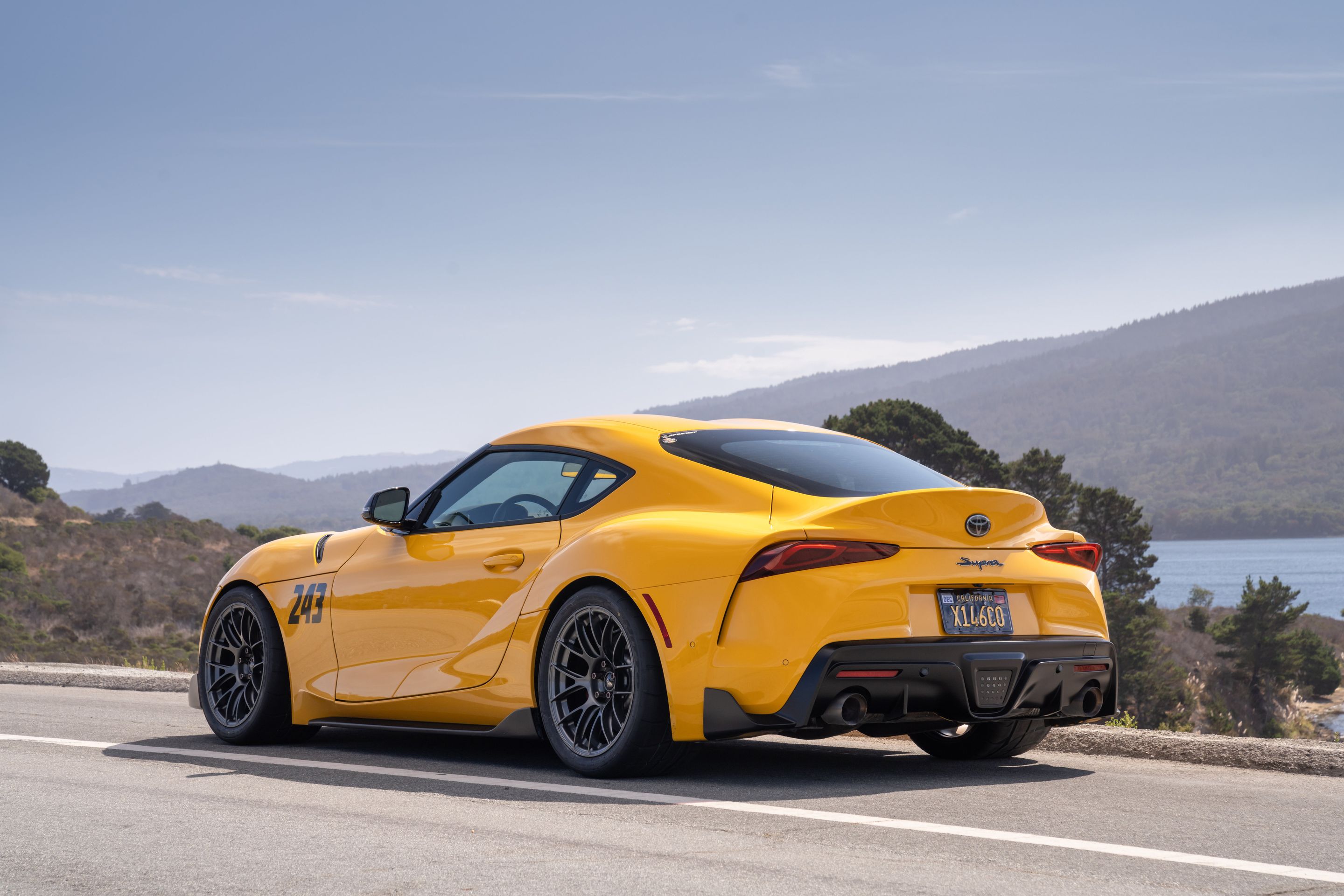 Yellow Toyota GR Supra with 18" EC-7RS Apex wheels in Anthracite
