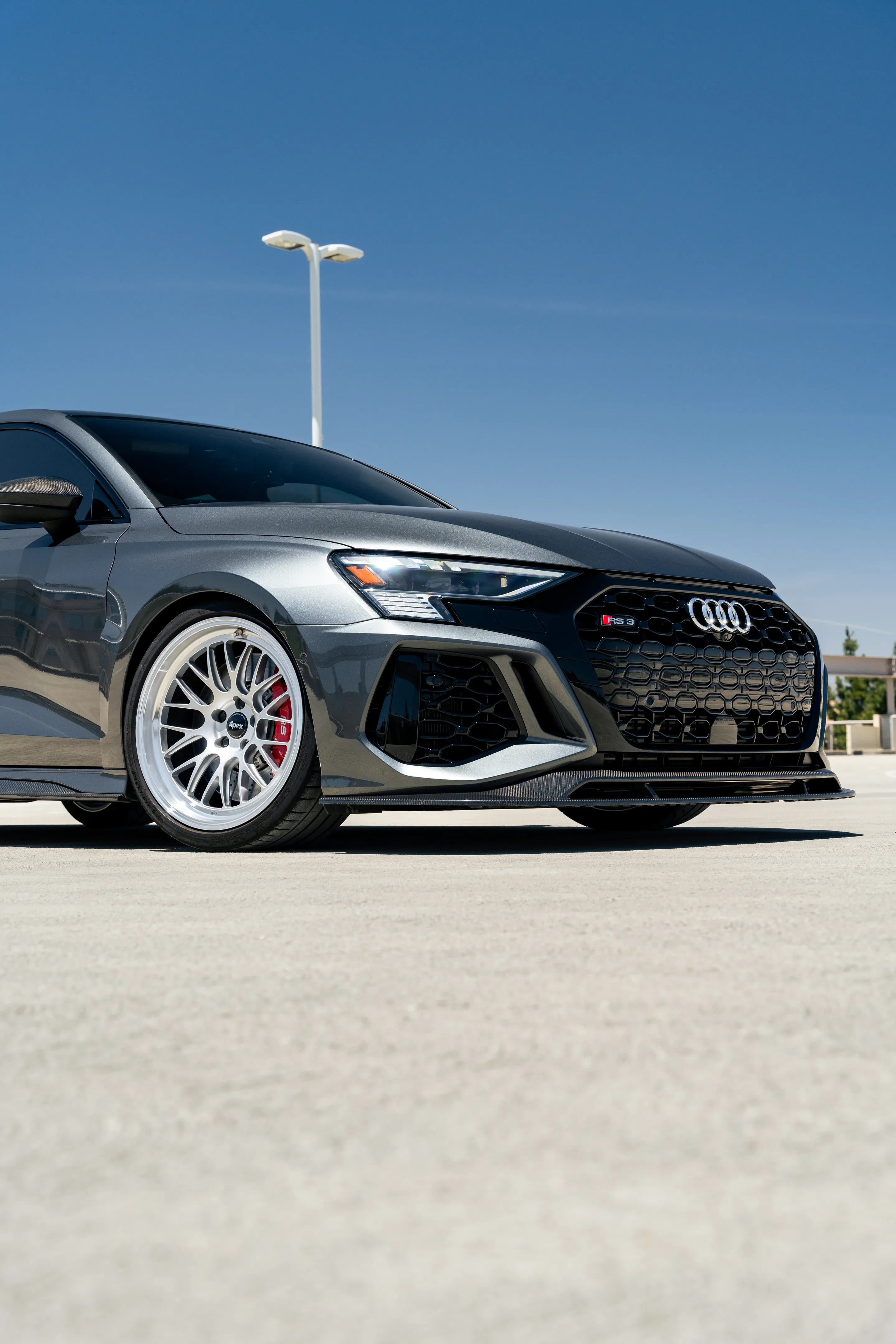 Grey Audi 8Y RS 3 with 19" ML-10RT Apex wheels in Machined Lip Race Silver
