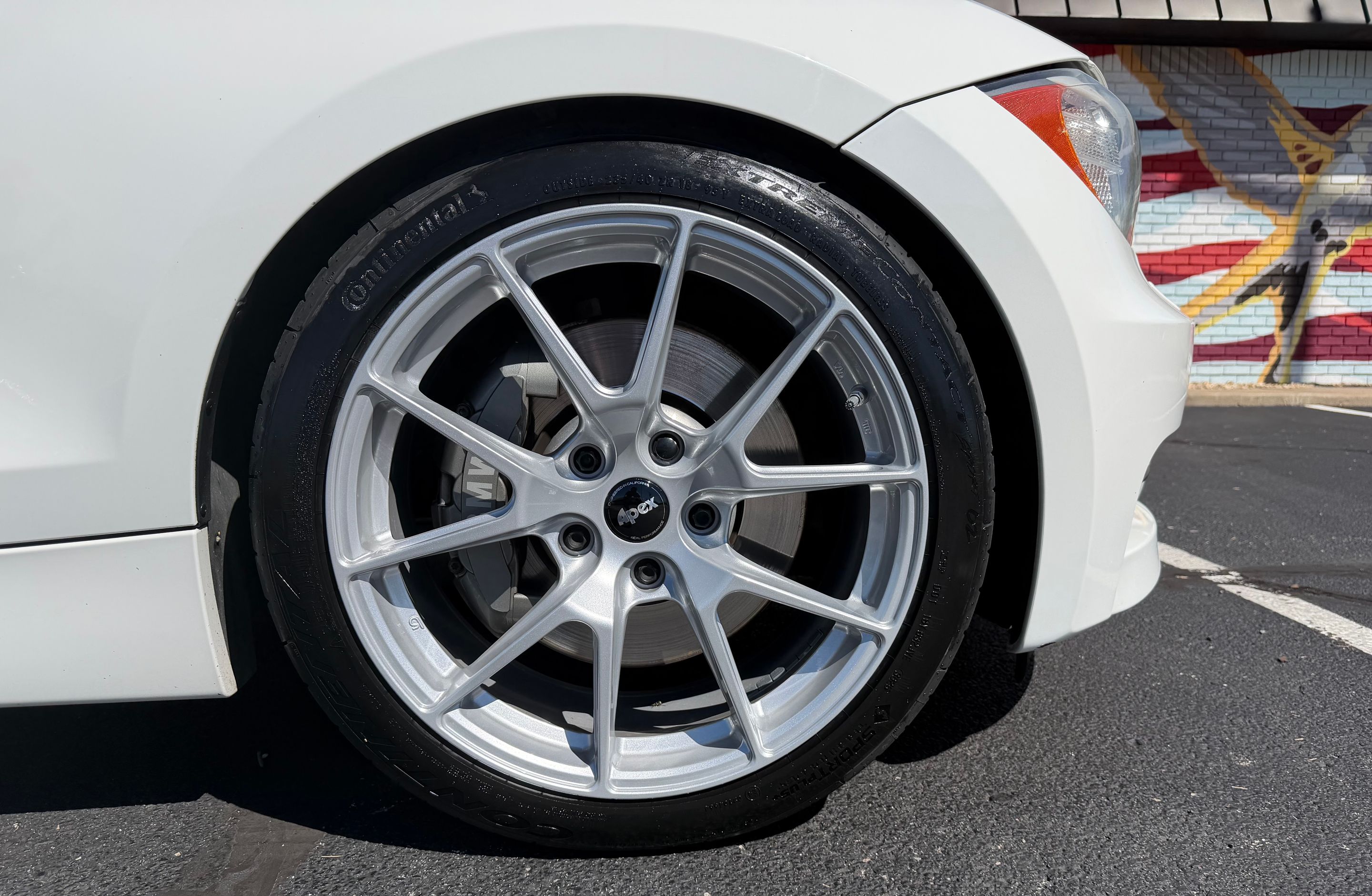 White BMW E82 Coupe 1 Series with 18" VS-5 Apex wheels in Race Silver