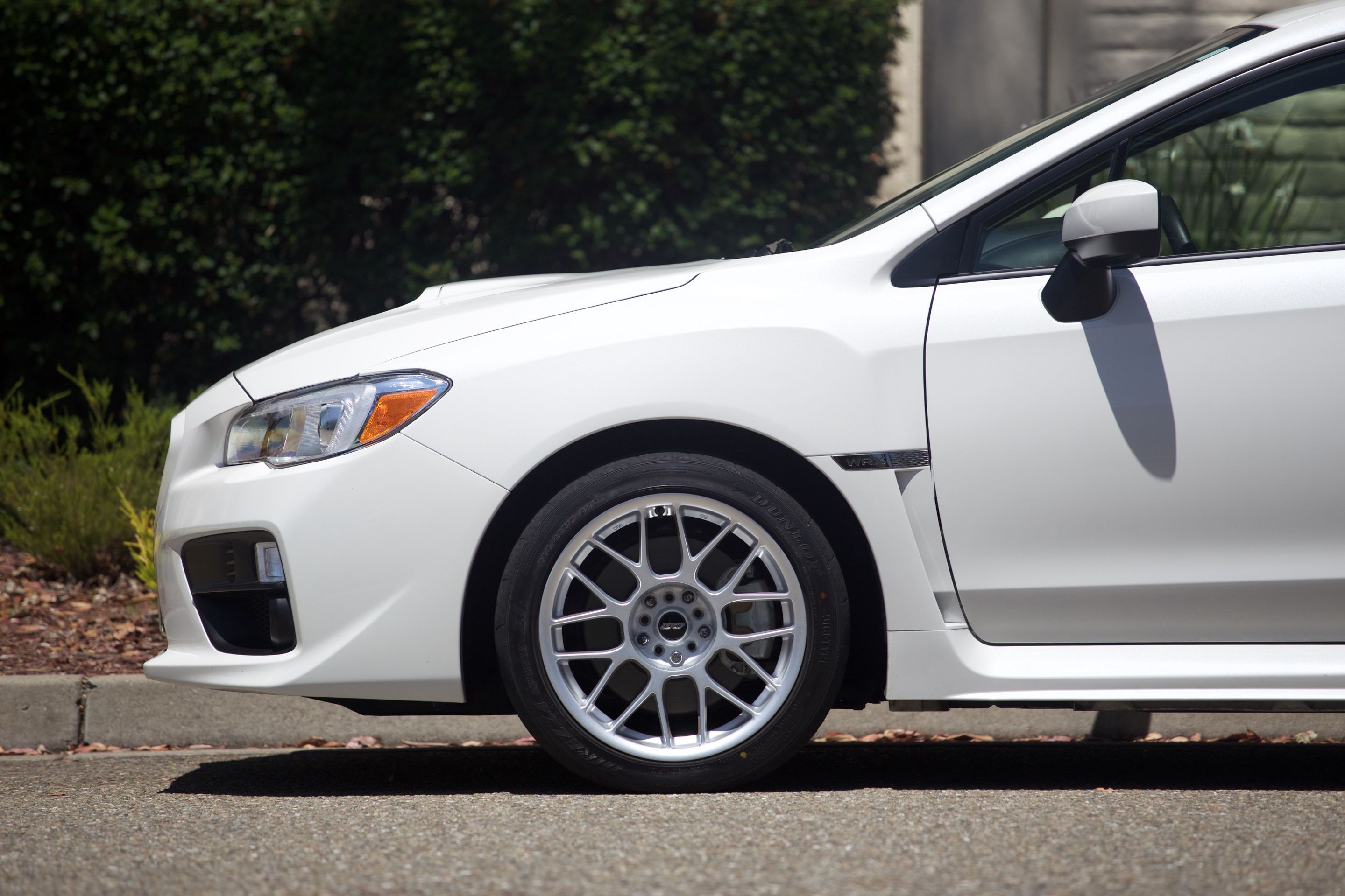 White Subaru VA WRX with 17" ARC-8 Apex wheels in Anthracite