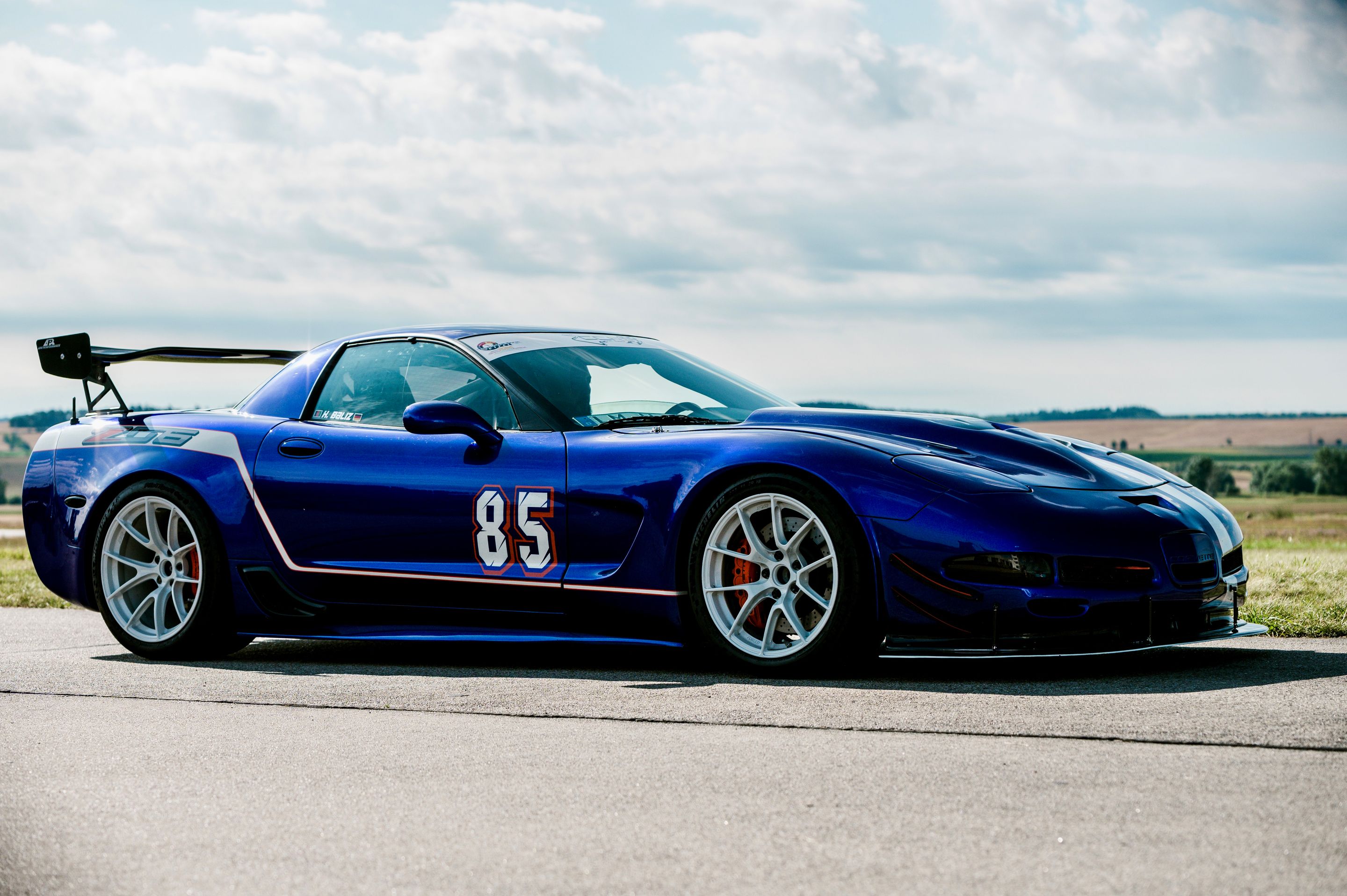 Blue Chevrolet C5 Corvette Z06 with 18"/19" VS-5RS Apex wheels in Custom Finish