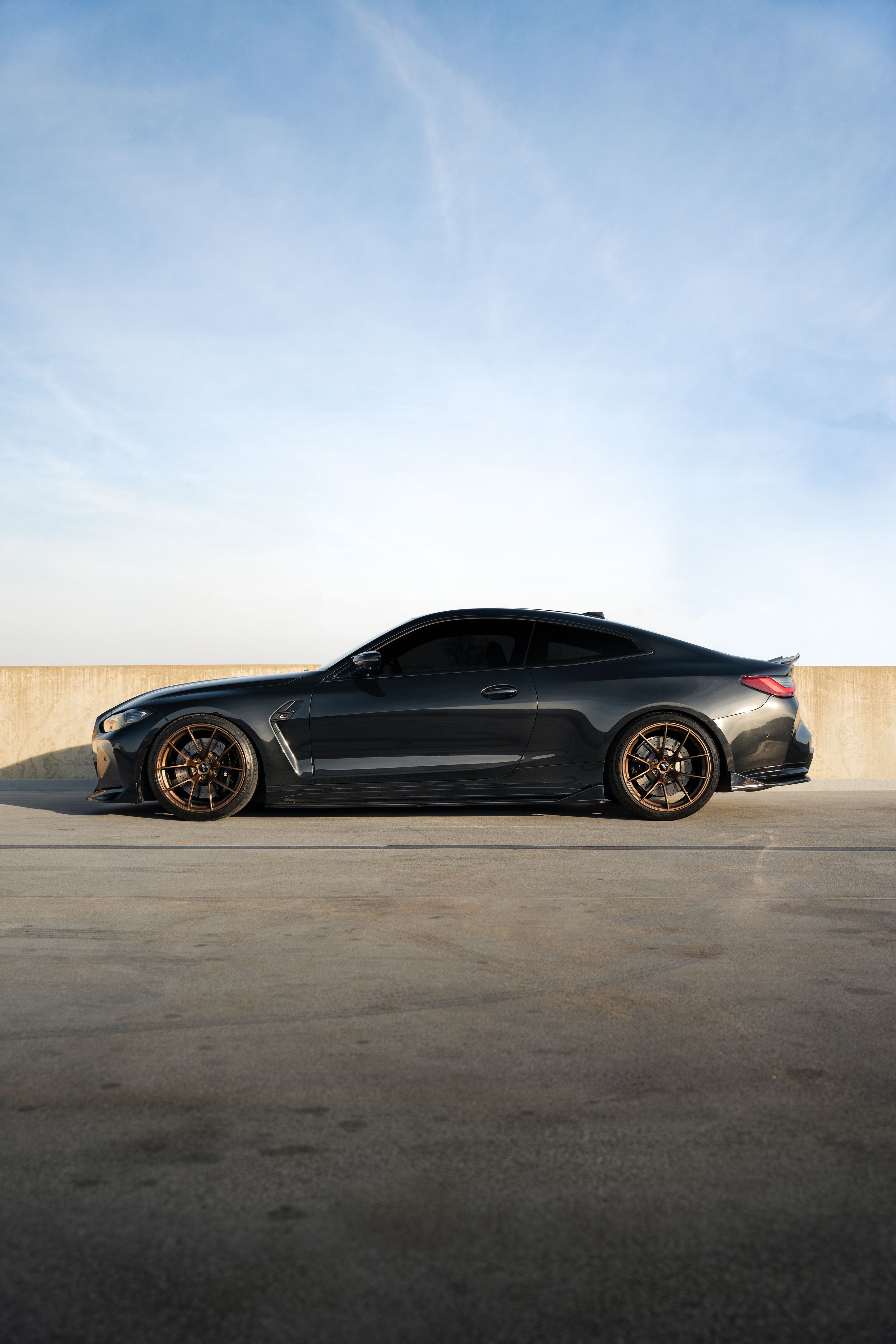 Black BMW G82 Coupe M4 with 20" VS-5RS Apex wheels in Satin Bronze