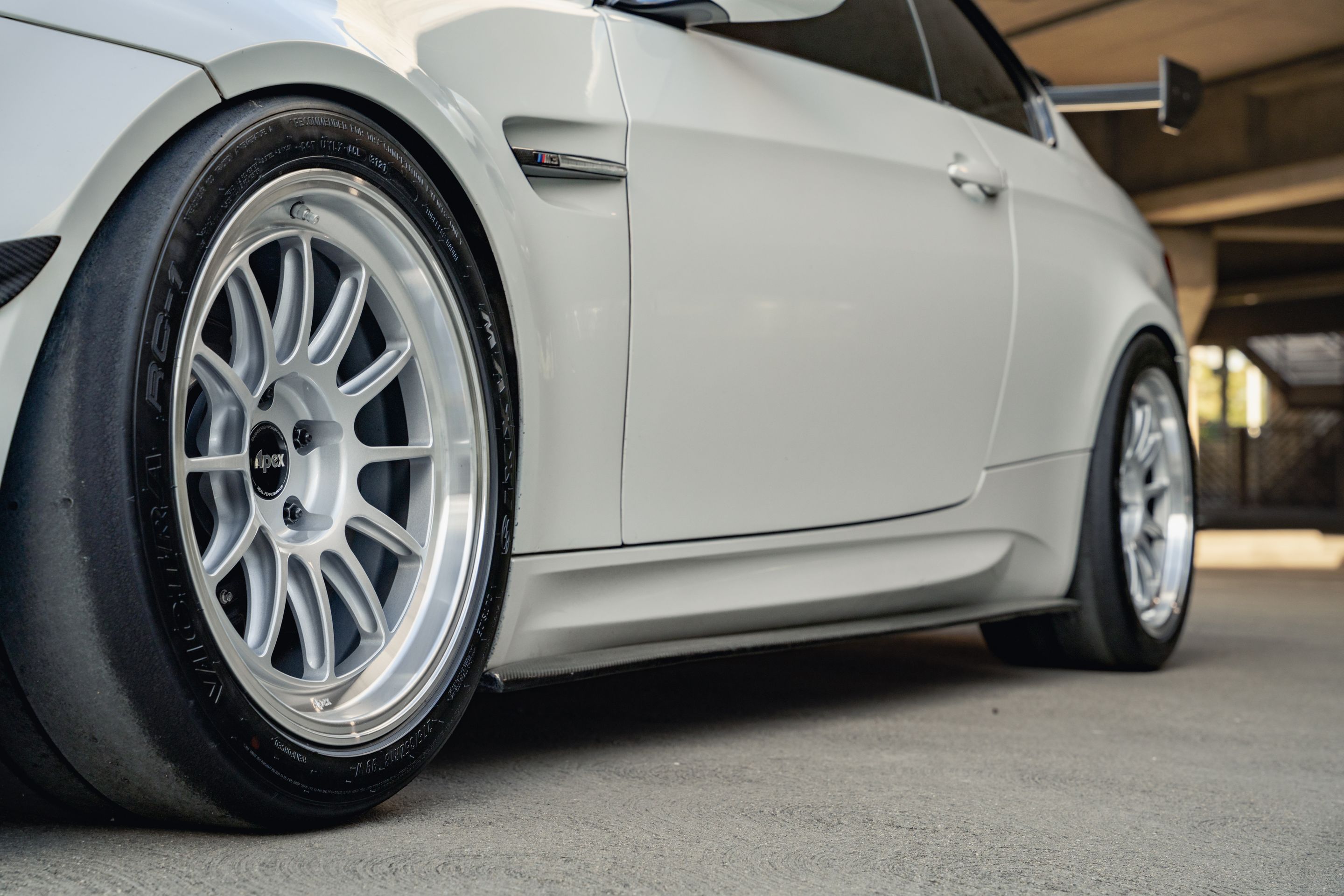 White BMW E92 Coupe M3 with 18" SL-12 Apex wheels in Machined Lip Race Silver