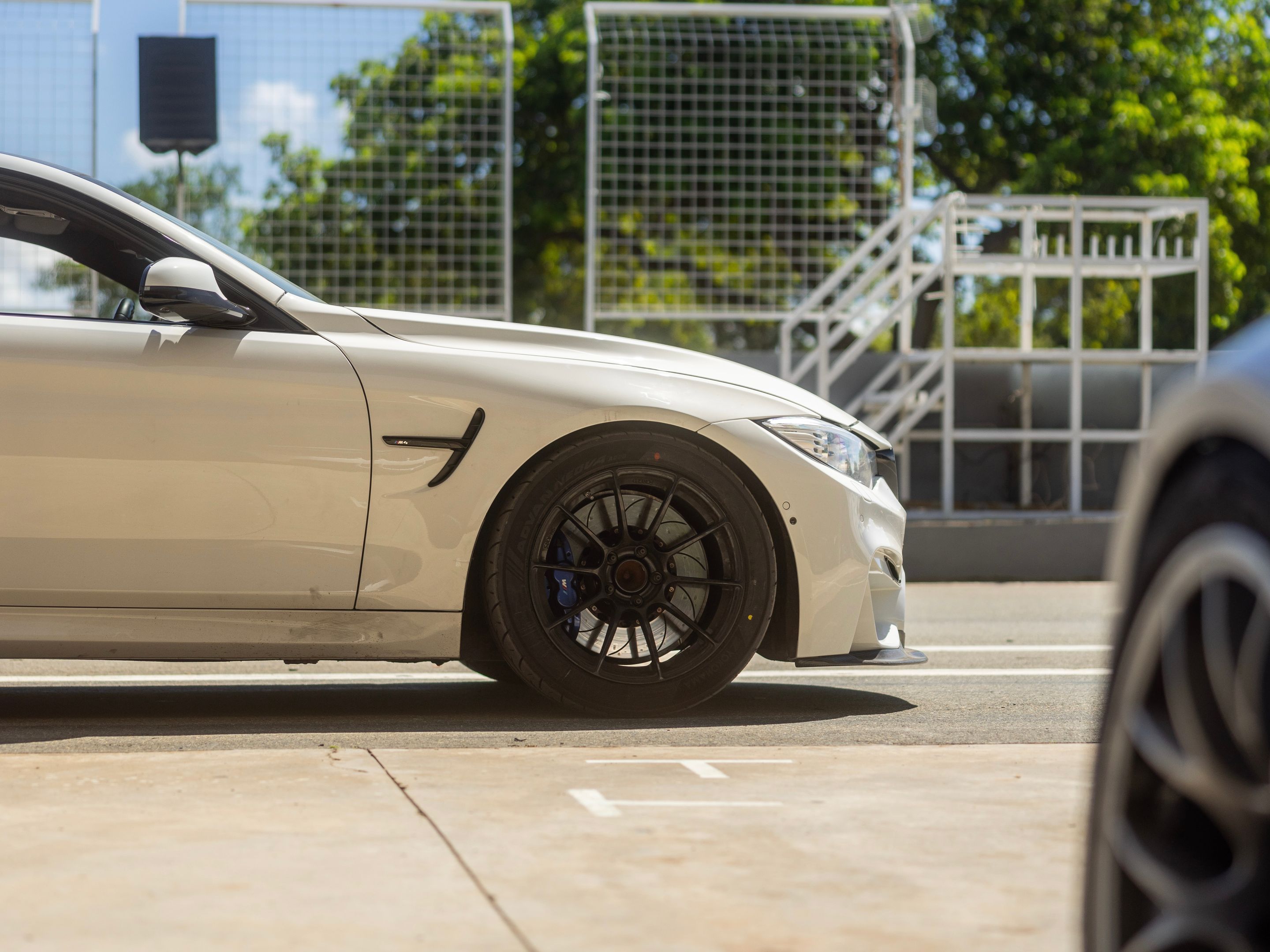 White BMW F82 Coupe M4 with 18" SM-10RS Apex wheels in Satin Black