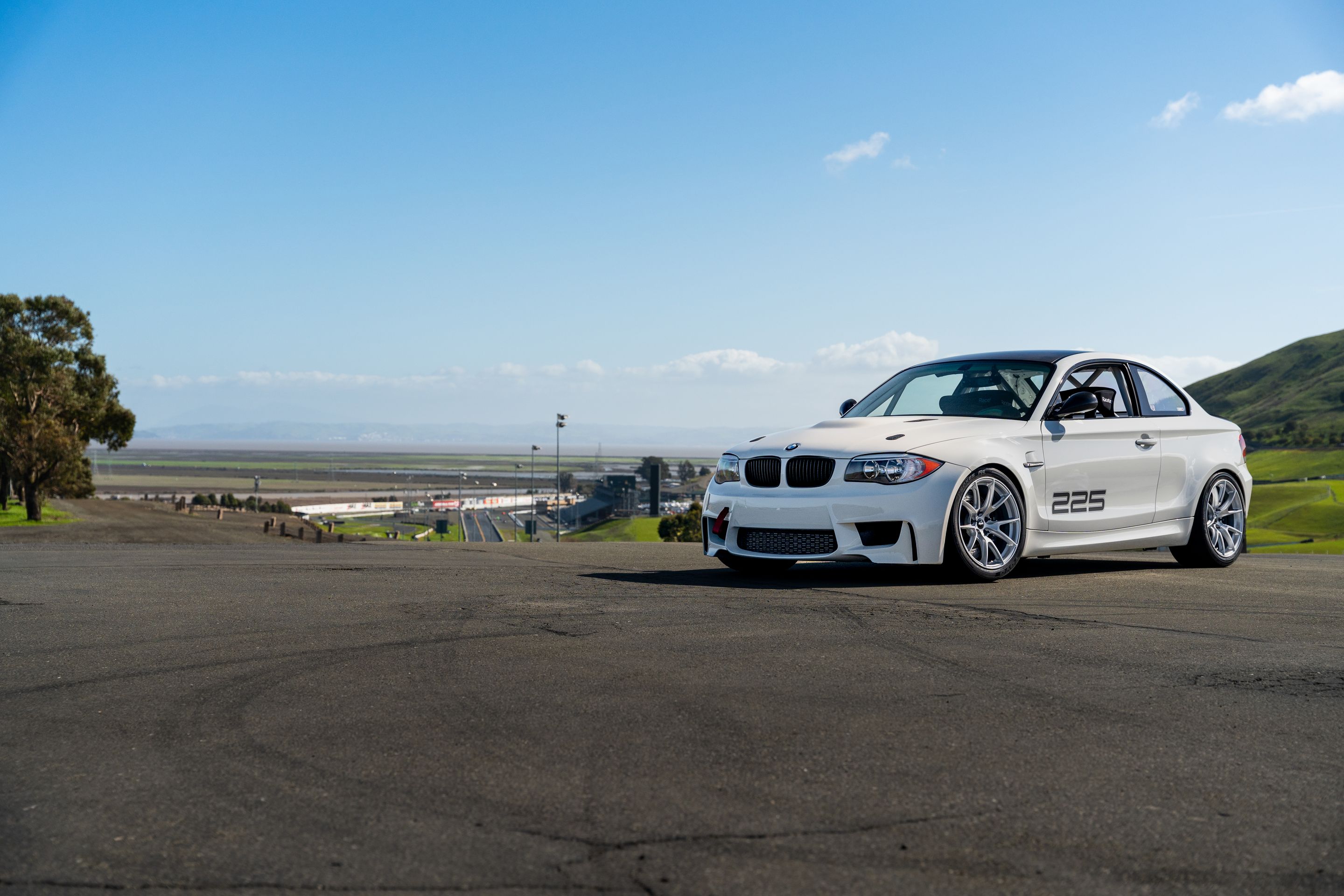 White BMW E82 1M with 18" VS-5 Apex wheels in Race Silver