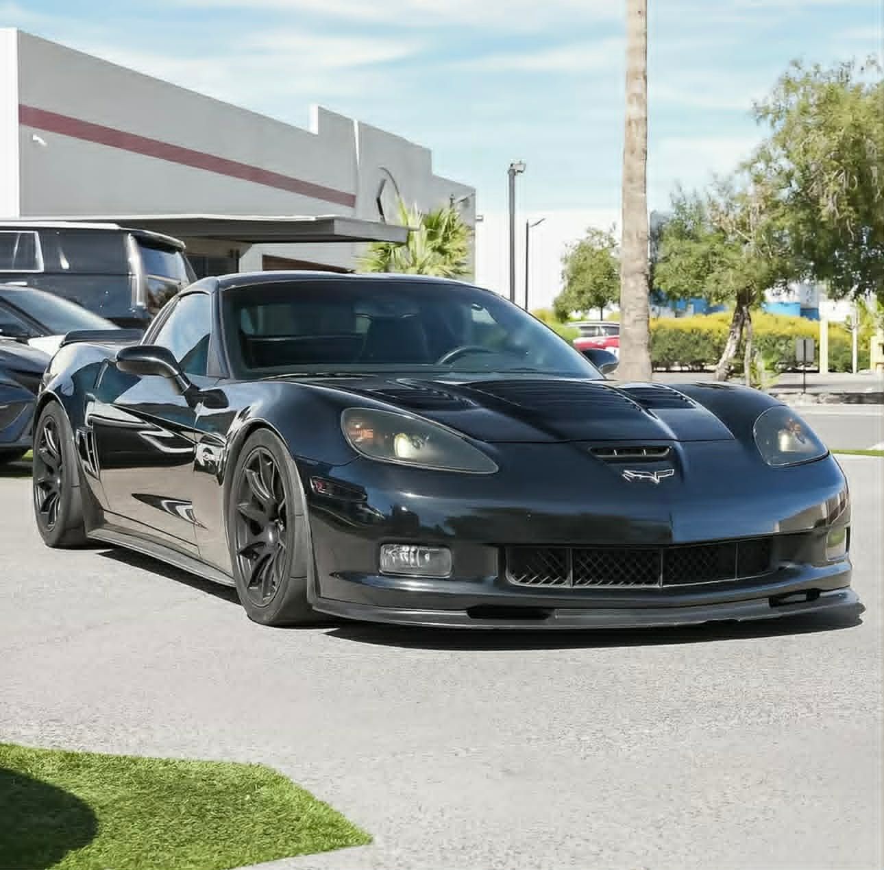 Black Chevrolet C6 Corvette Z06 with 18" SM-10 Apex wheels in Satin Black