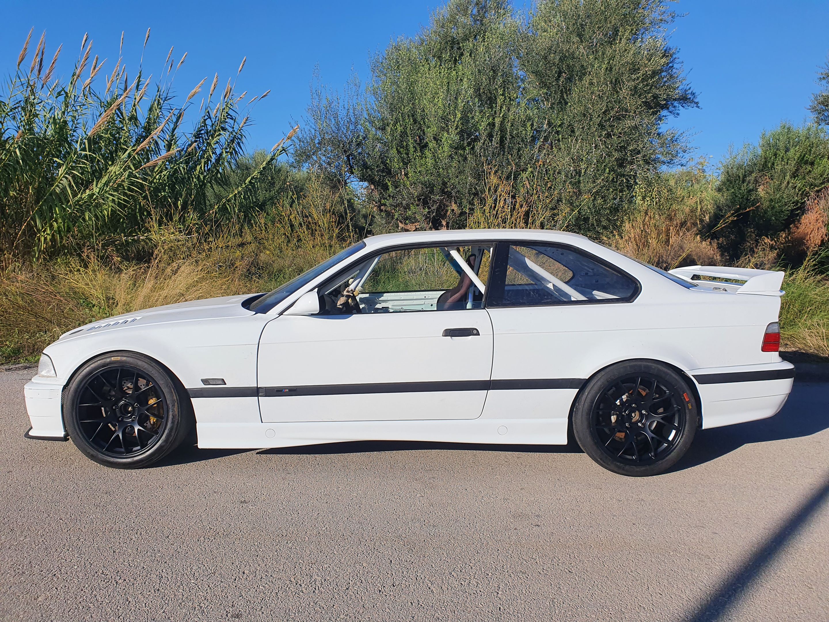 White BMW E36 3 Series with 18" EC-7 Apex wheels in Satin Black