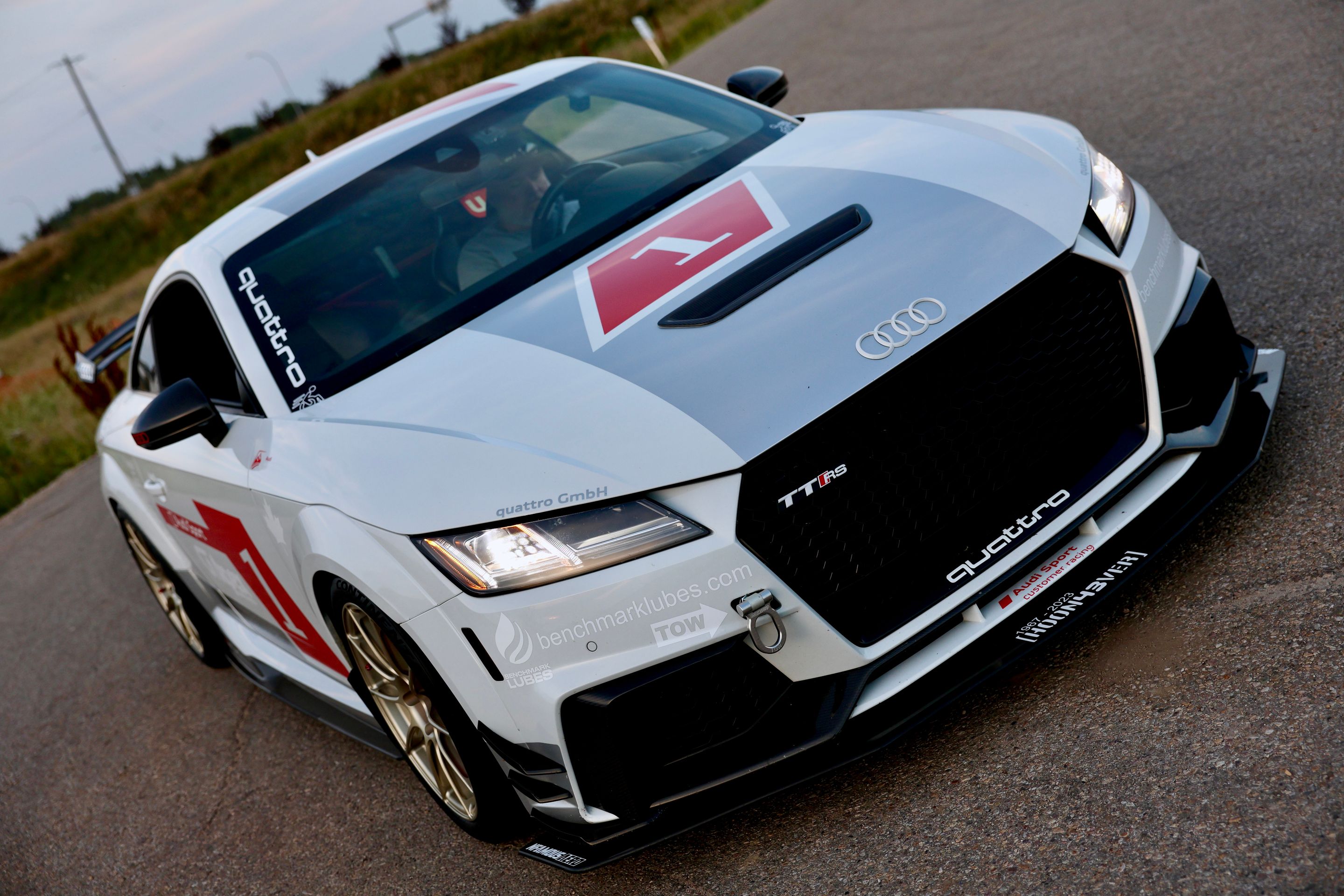 White Audi FV/8S TT RS with 18" SM-10RS Apex wheels in Motorsport Gold