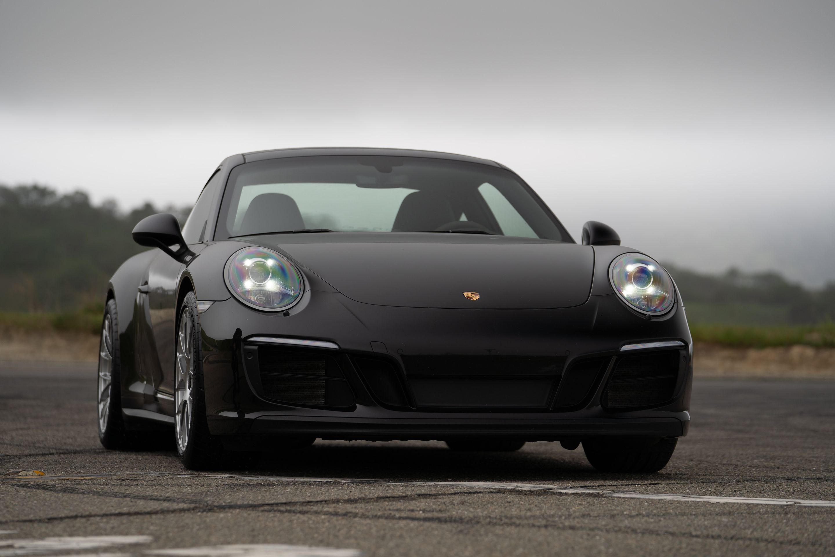 Black Porsche 911 991.2 Carrera GTS with 19" EC-7RS Apex wheels in Race Silver