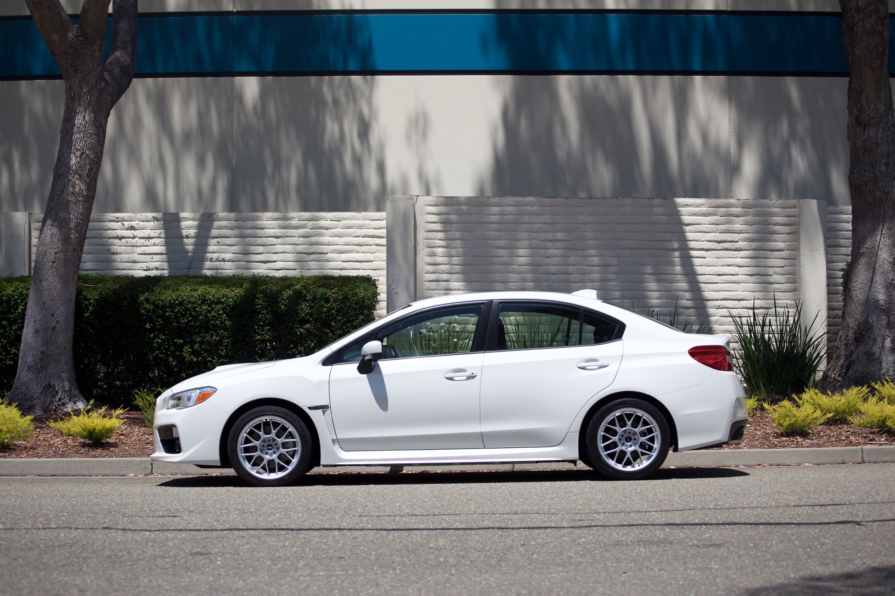 White Subaru VA WRX with 17" ARC-8 Apex wheels in Anthracite