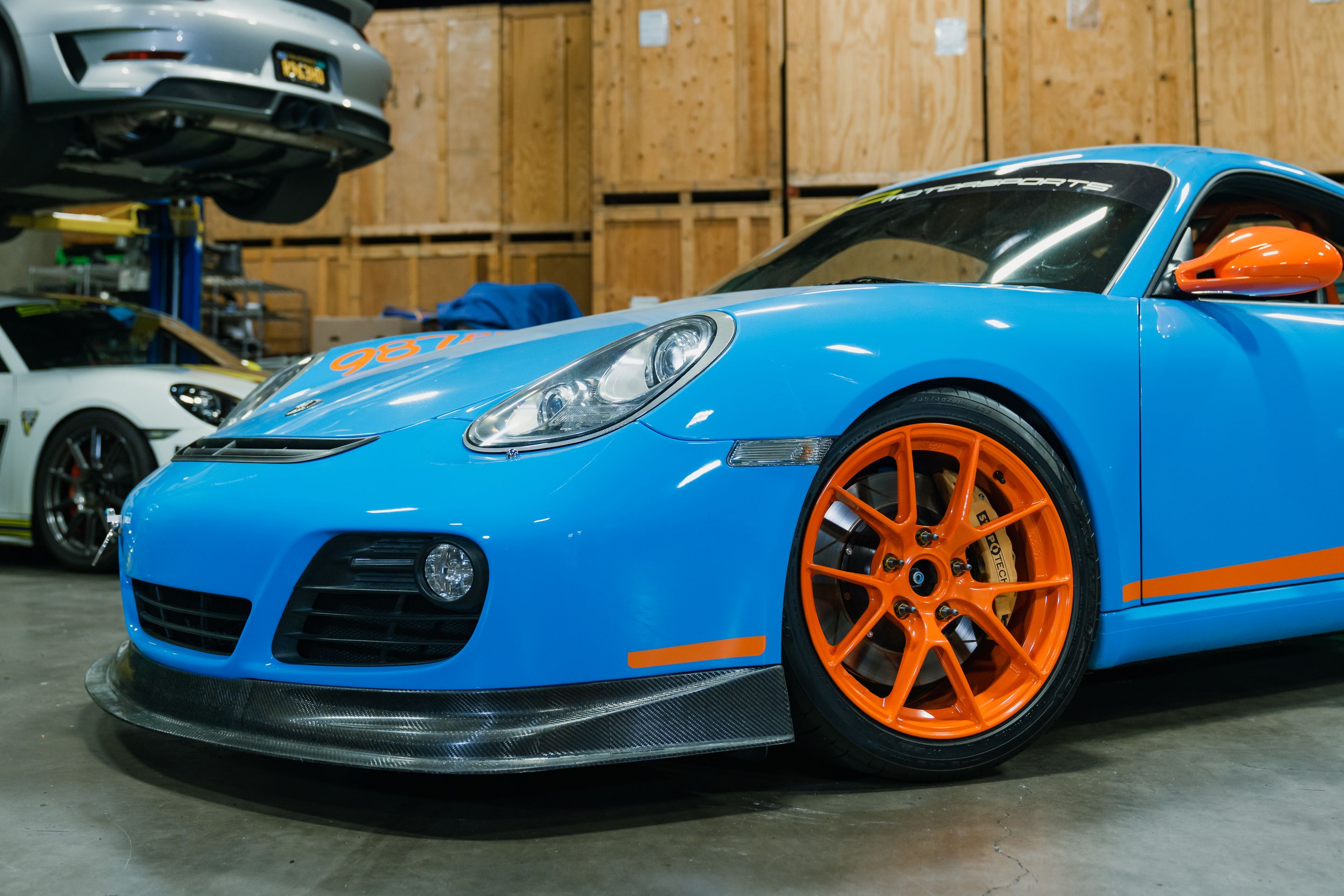 Blue Porsche 987 Cayman S with 18" VS-5RS Apex wheels in Custom Finish
