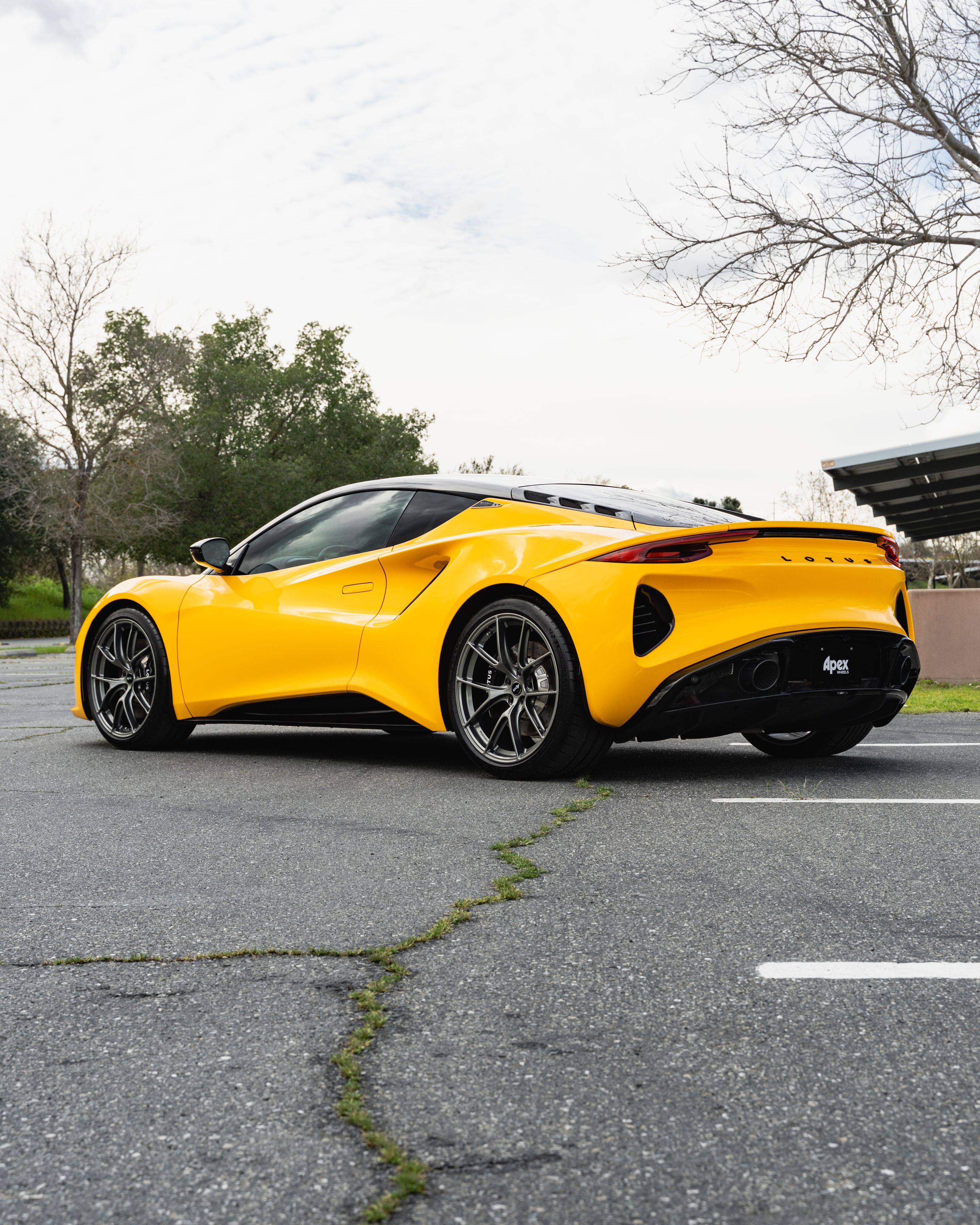 Yellow Lotus Emira with 20" VS-5RS Apex wheels in Anthracite