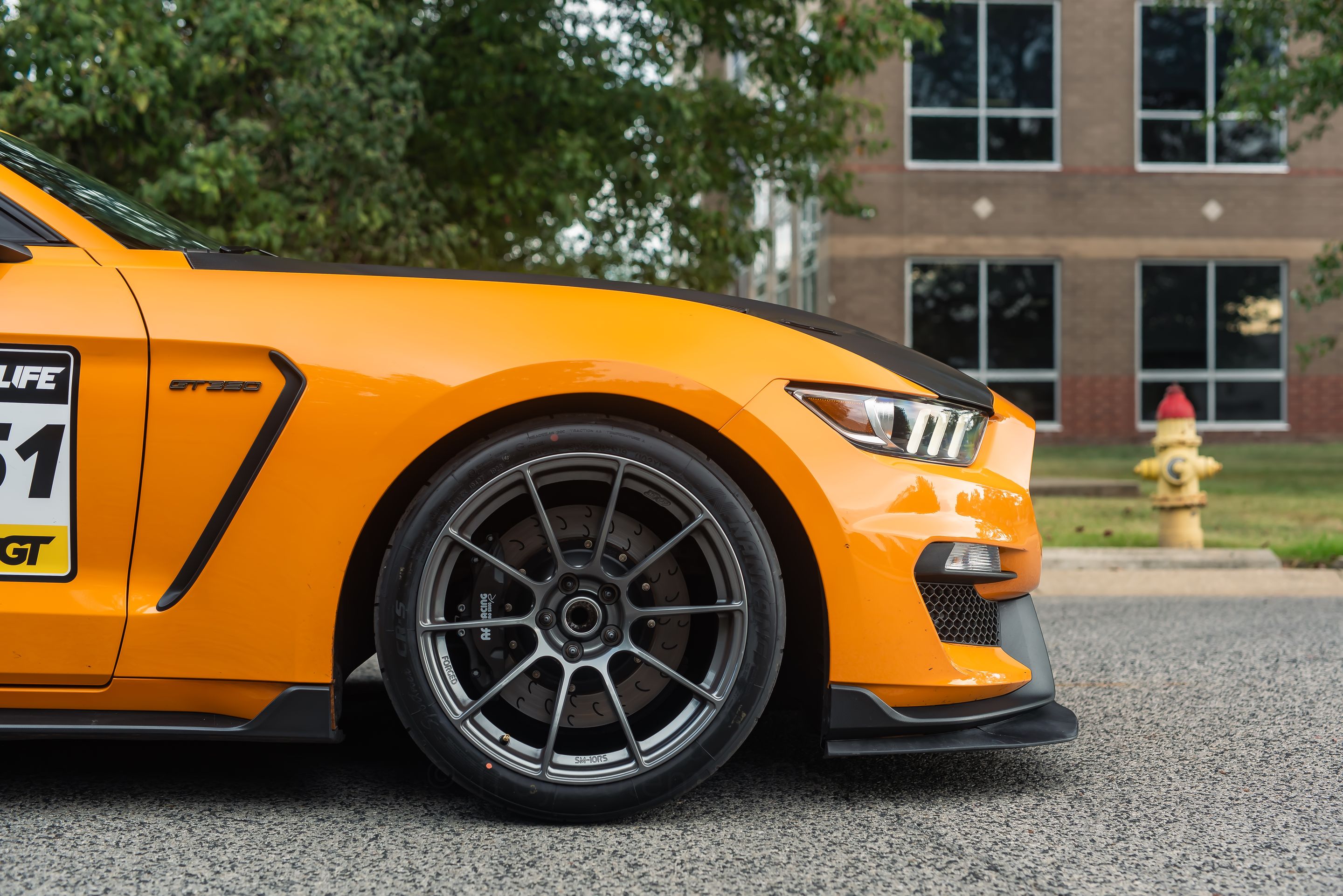 Orange Ford S550 Mustang GT350 with 19" SM-10RS Apex wheels in Anthracite