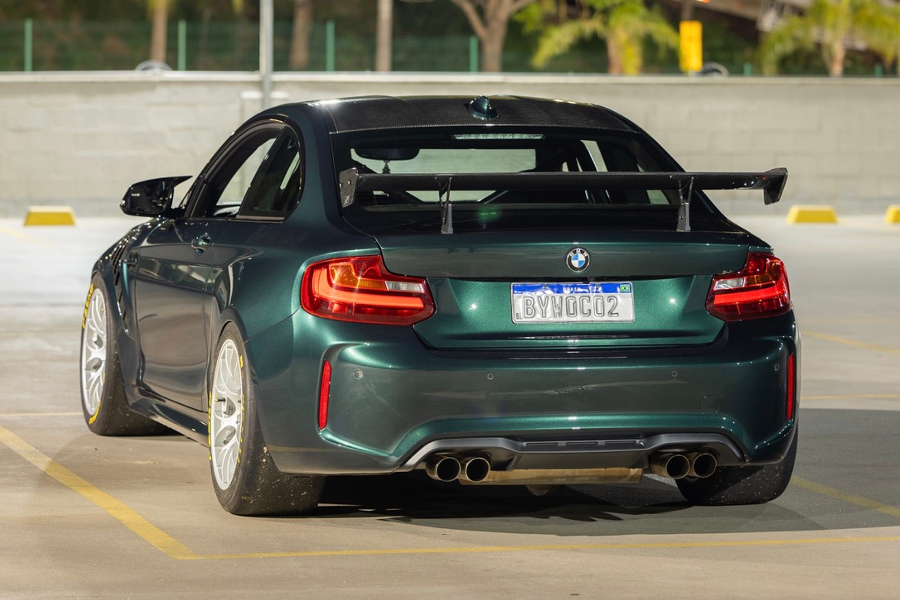 Green BMW F87 M2 with 18" EC-7 Apex wheels in Race Silver