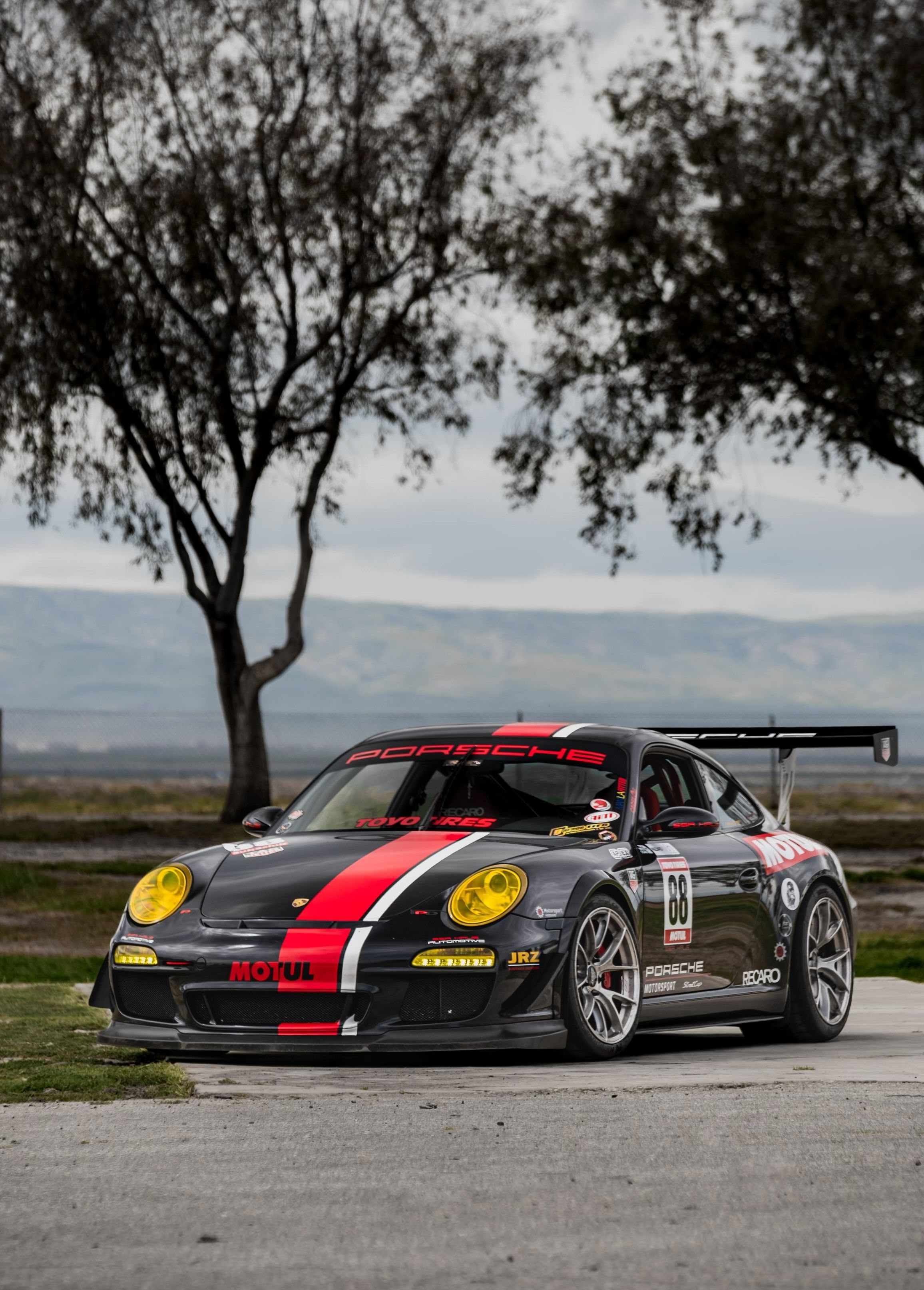 Black Porsche 911 997 Carrera S with 18" VS-5RS Apex wheels in Brushed Clear