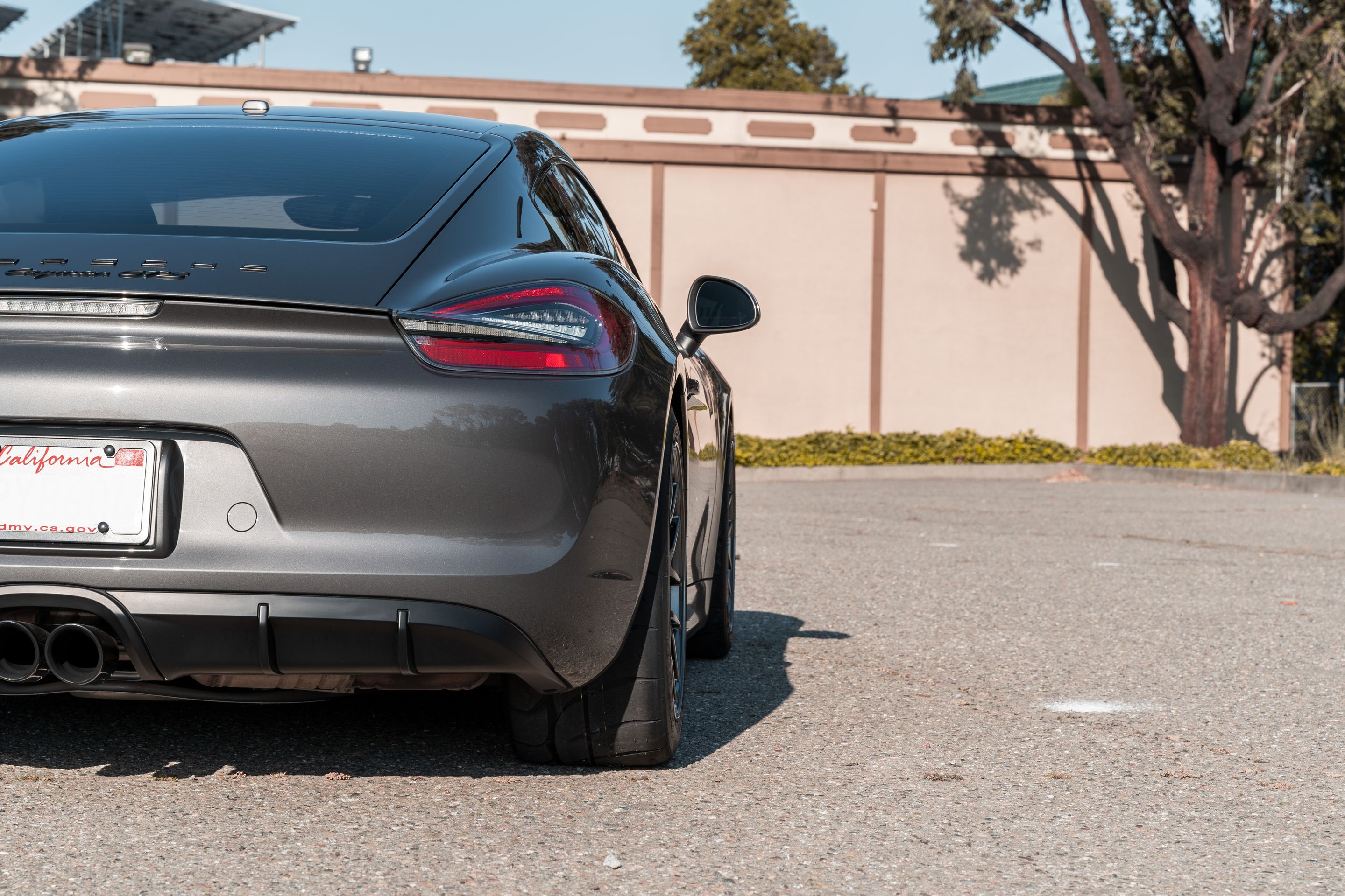Grey Porsche 981 Cayman GTS with 18" EC-7R Apex wheels in Anthracite