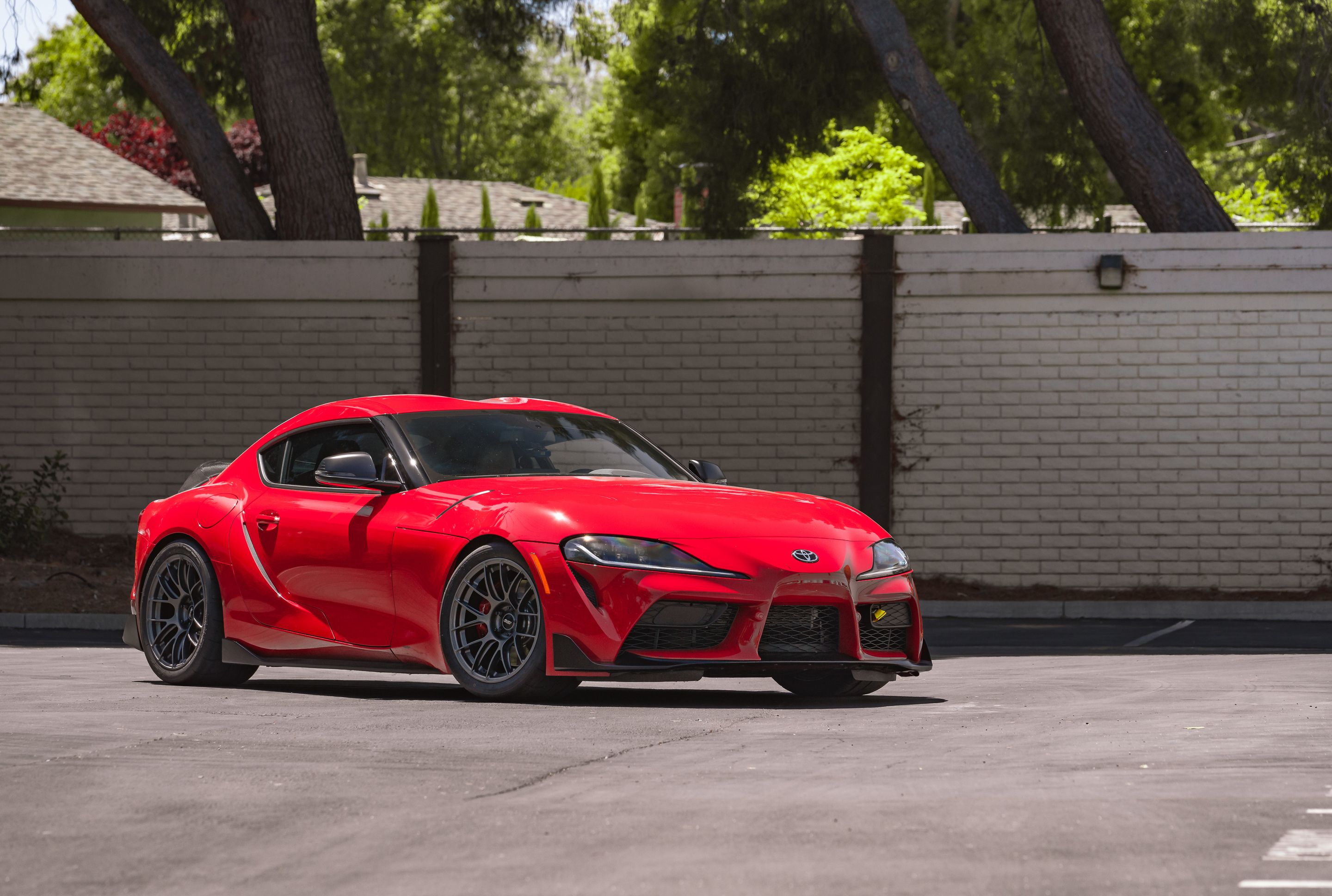 Red Toyota GR Supra with 18" EC-7RS Apex wheels in Anthracite