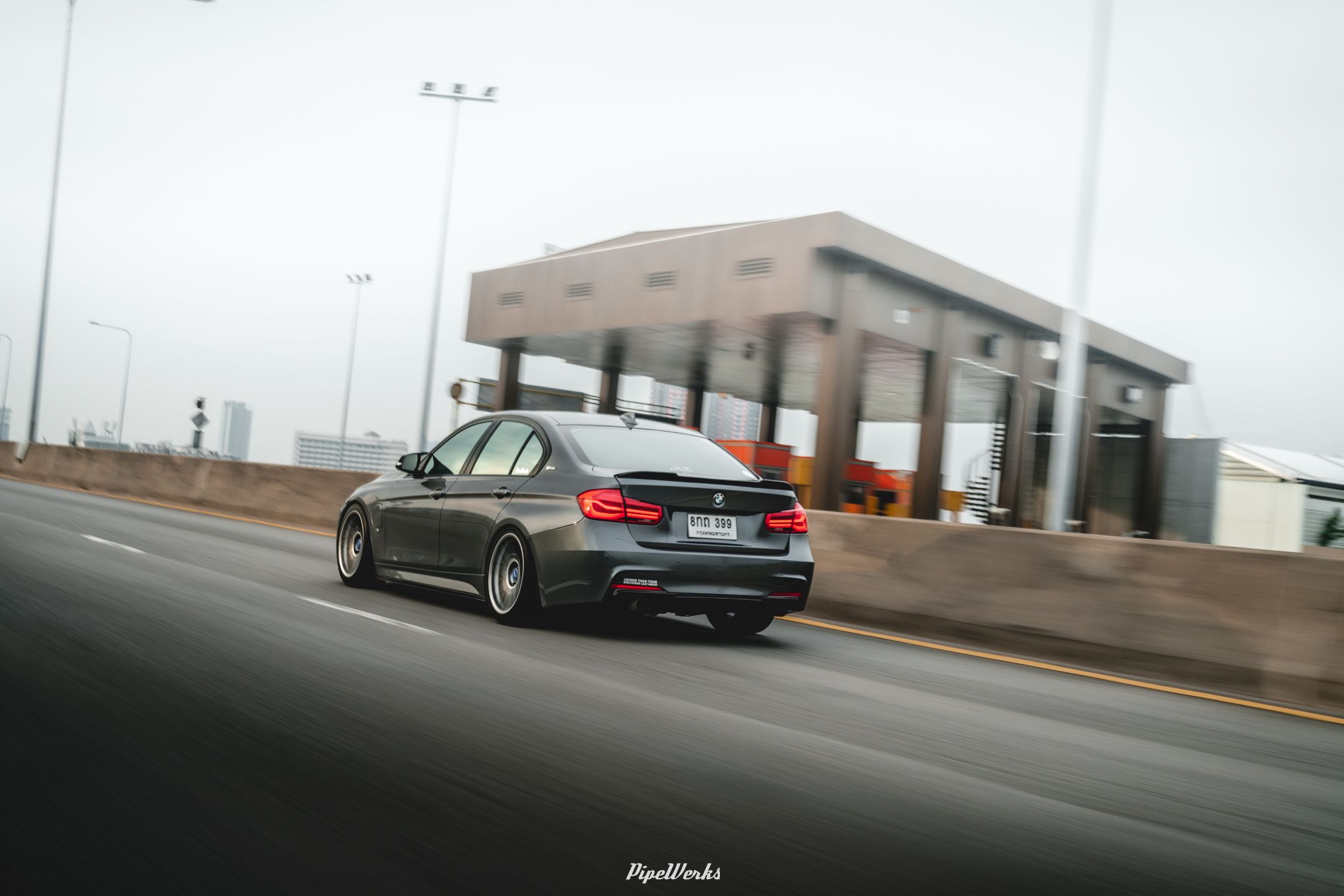 Grey BMW F30 Sedan 3 Series with 18" ARC-8 Apex wheels in Hyper Black