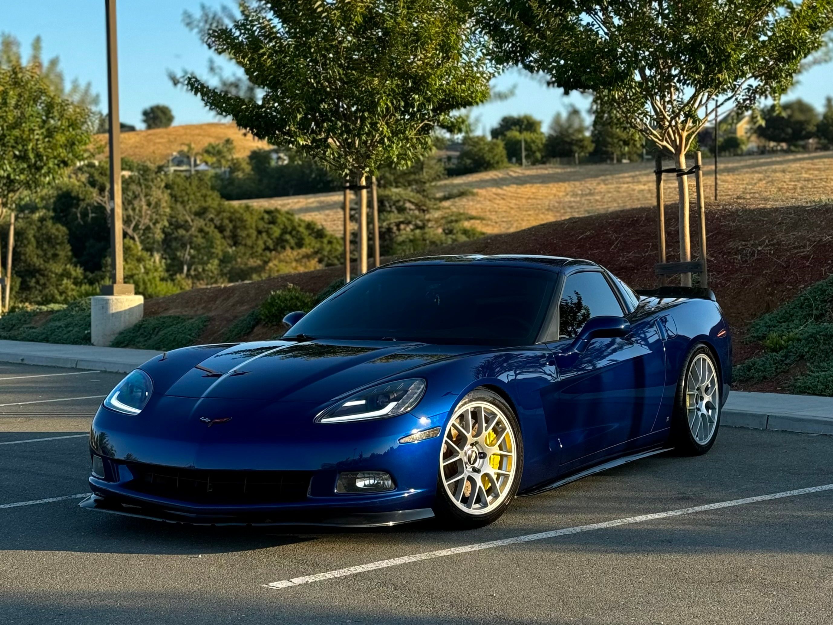 Blue Chevrolet C6 Corvette Base/Z51 with 18"/19" EC-7 Apex wheels in Race Silver