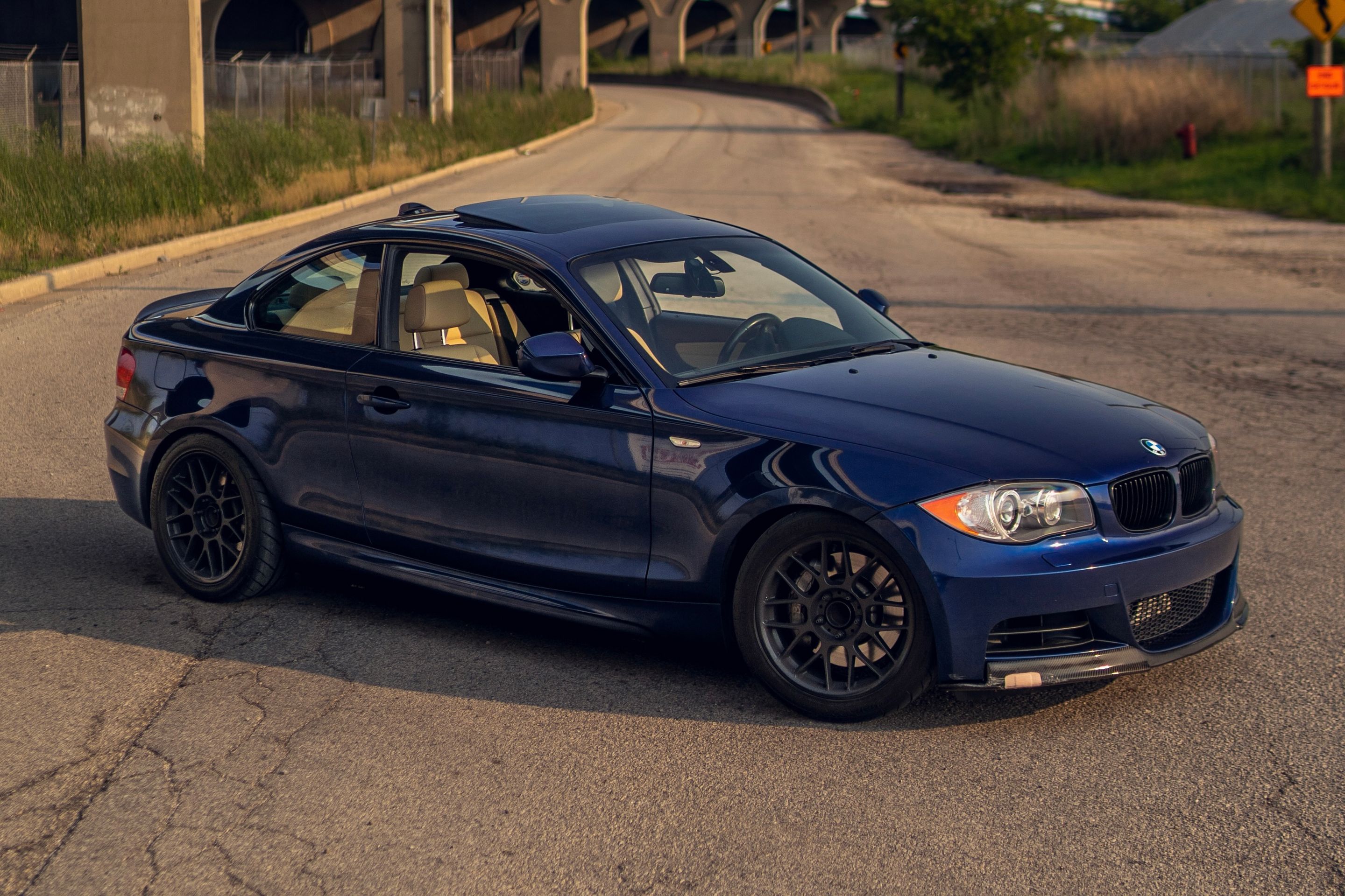 Blue BMW E82 Coupe 1 Series with 17" ARC-8 Apex wheels in Satin Black