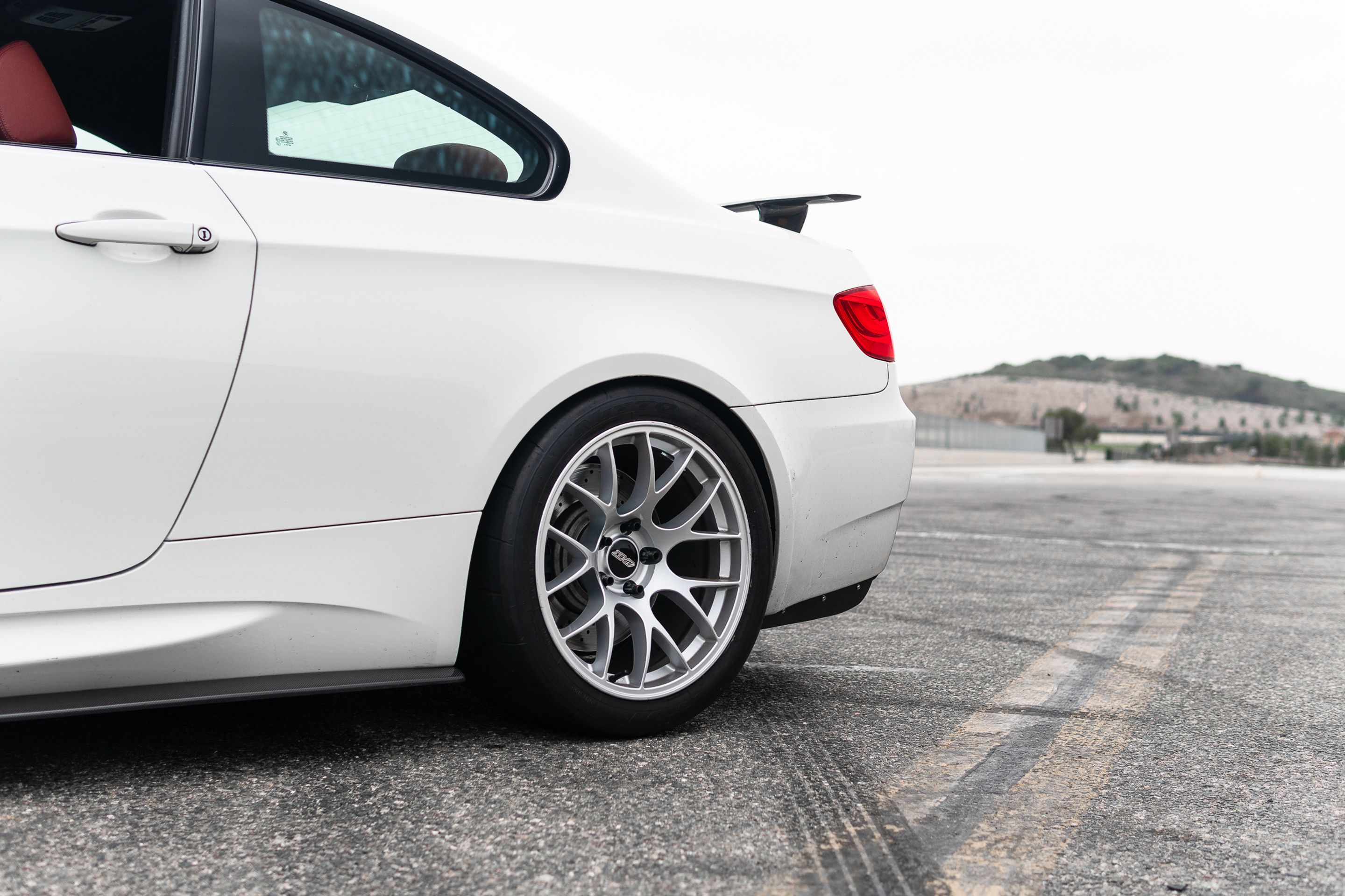 White BMW E92 Coupe M3 with 18" EC-7 Apex wheels in Race Silver