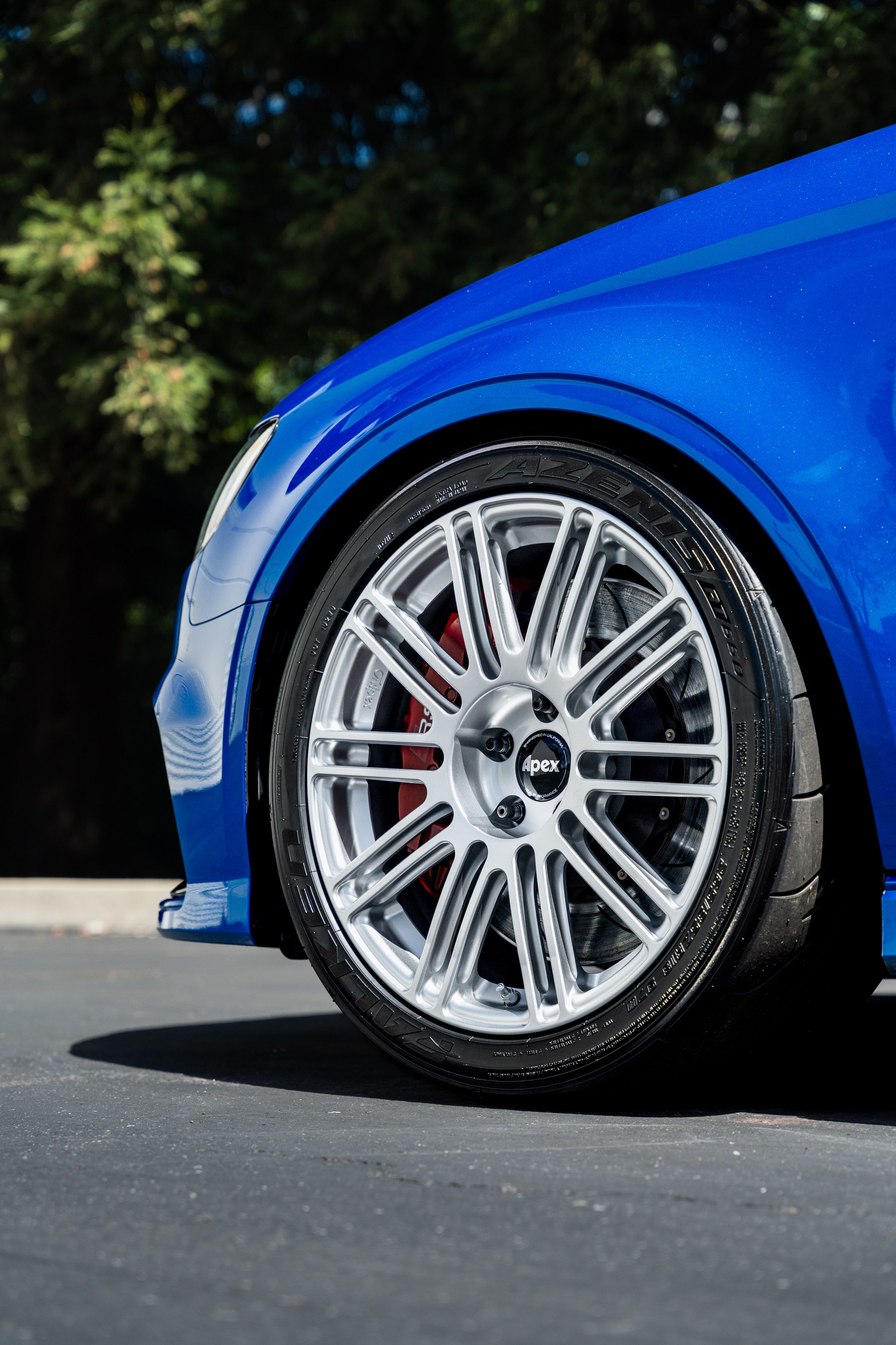 Blue Audi 8V RS 3 with 18" TC-10RT Apex wheels in Race Silver