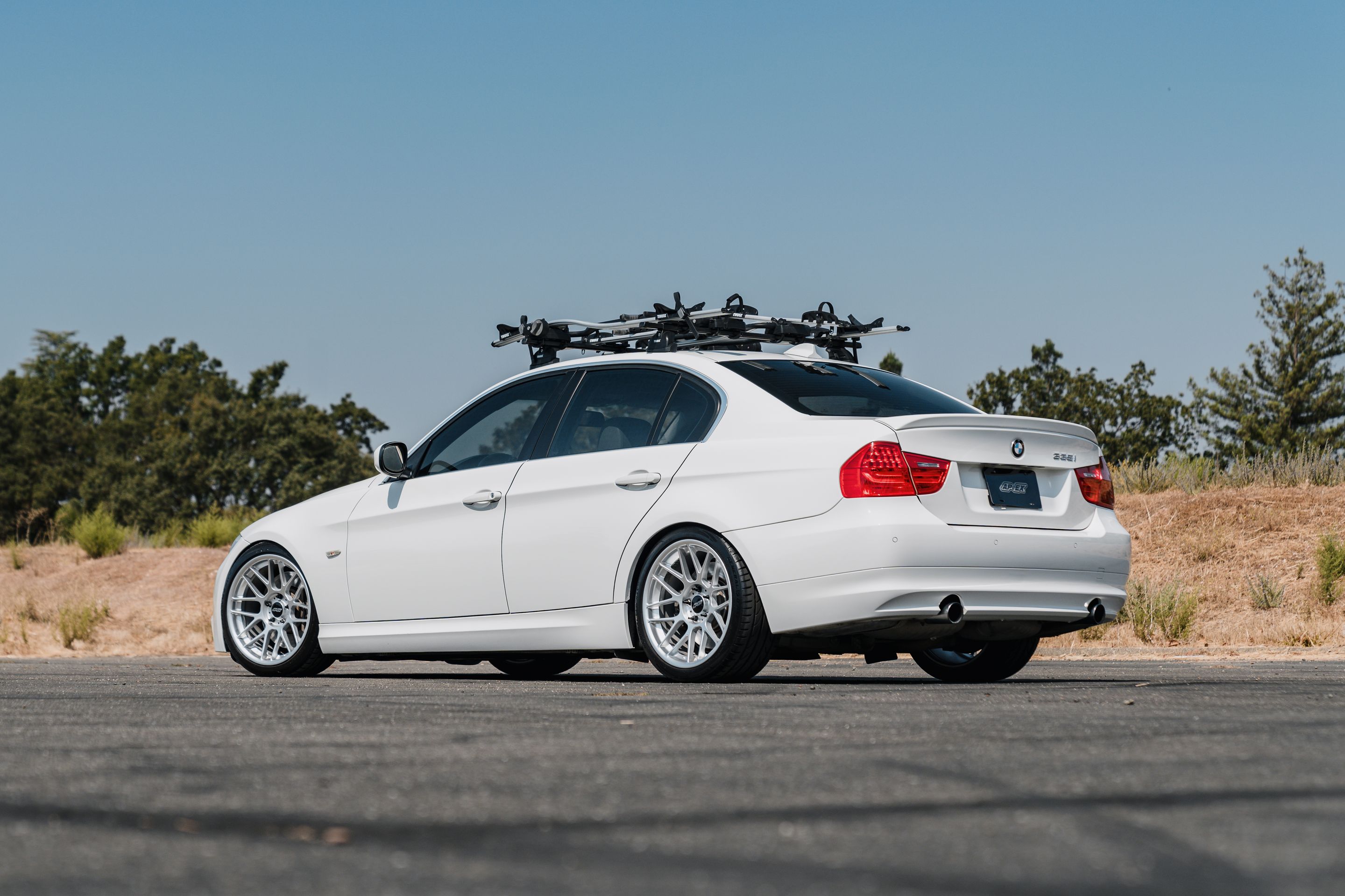 White BMW E90 LCI Sedan 3 Series with 18" ARC-8 Apex wheels in Hyper Silver
