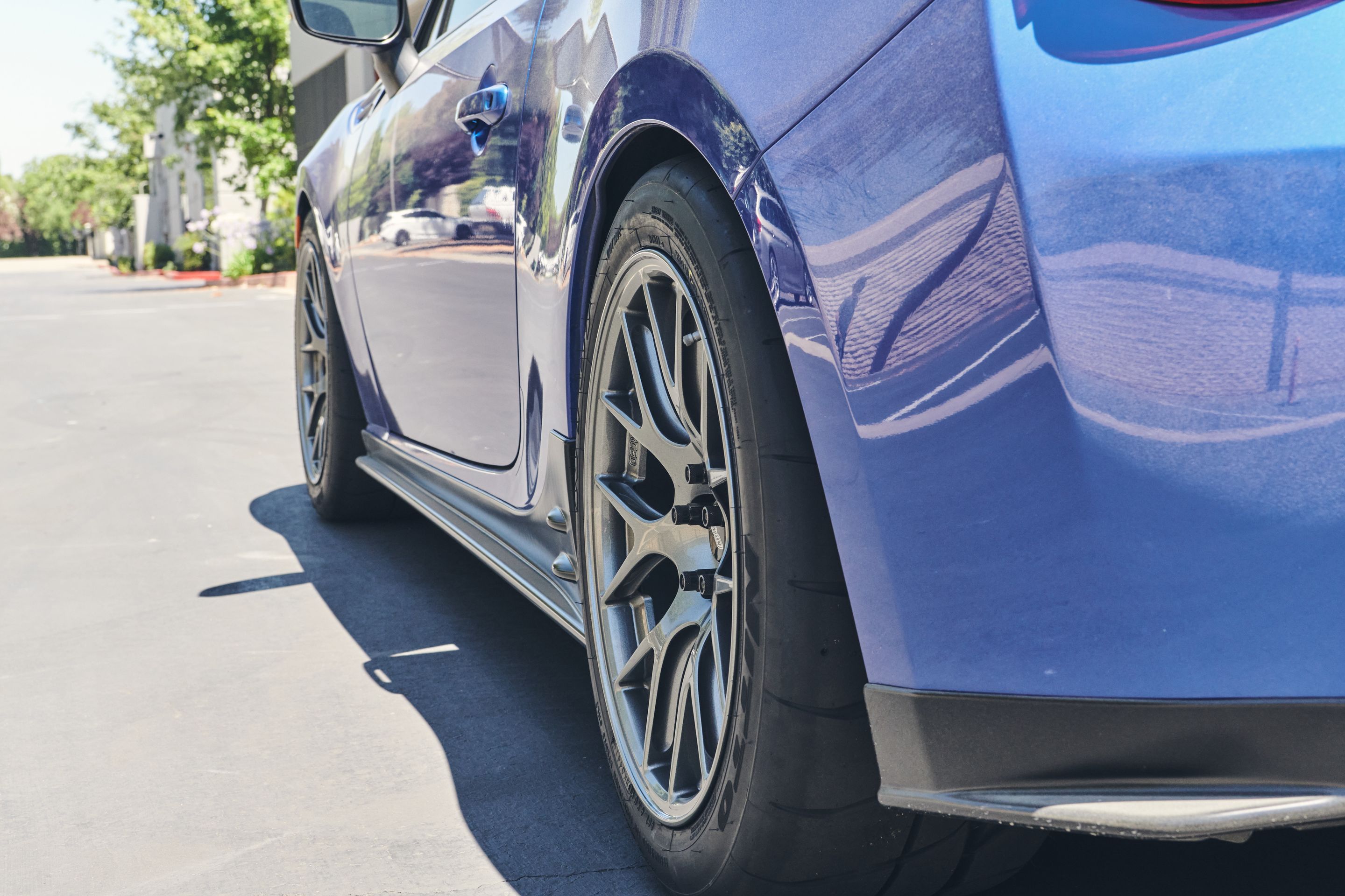 Blue Subaru ZC6 / Gen 1 BRZ with 17" EC-7R Apex wheels in Anthracite