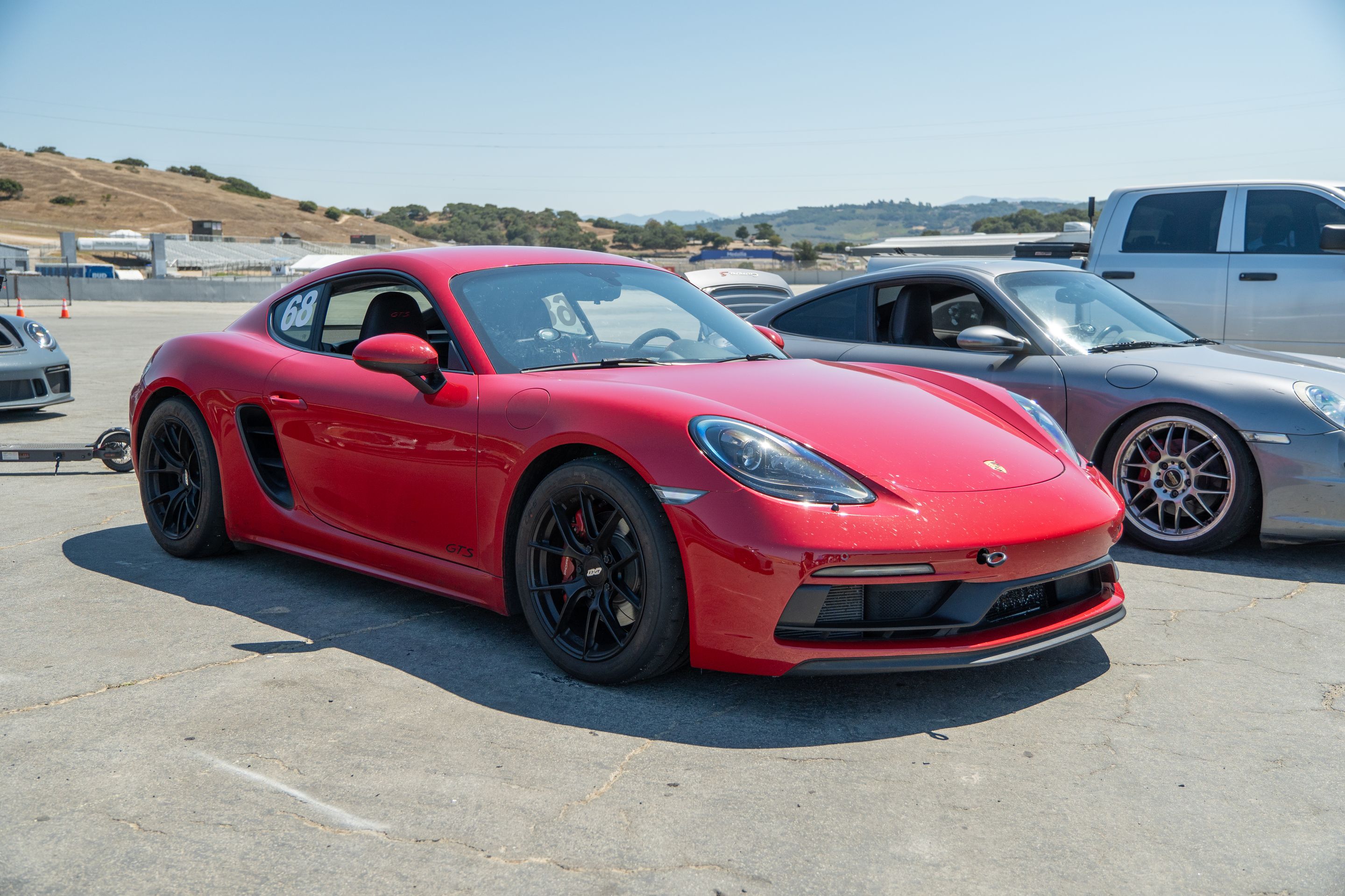 Red Porsche 718 Cayman GTS 2.5L with 18" VS-5RS Apex wheels in Satin Black