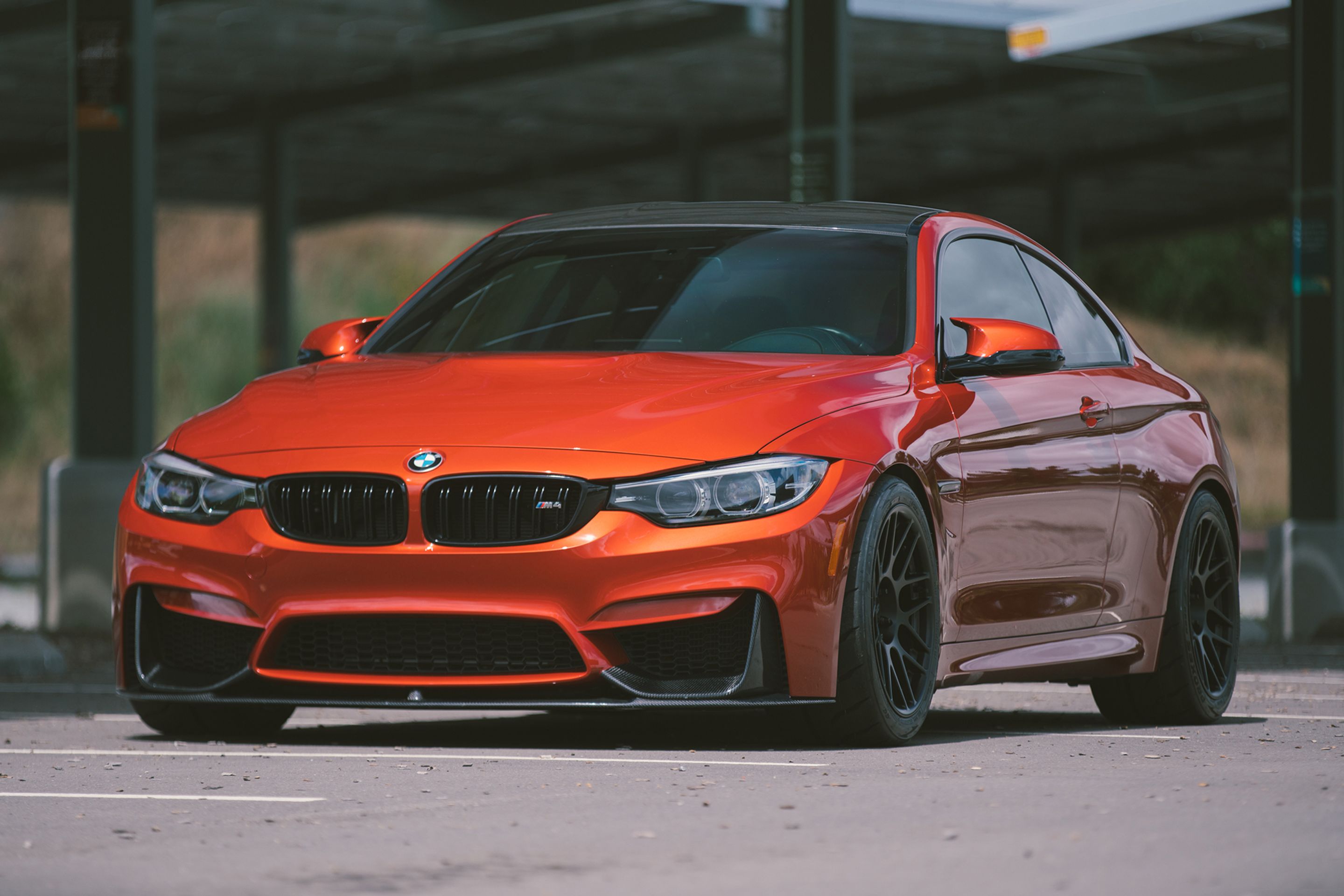 Red BMW F82 Coupe M4 with 18" ARC-8R Apex wheels in Satin Black