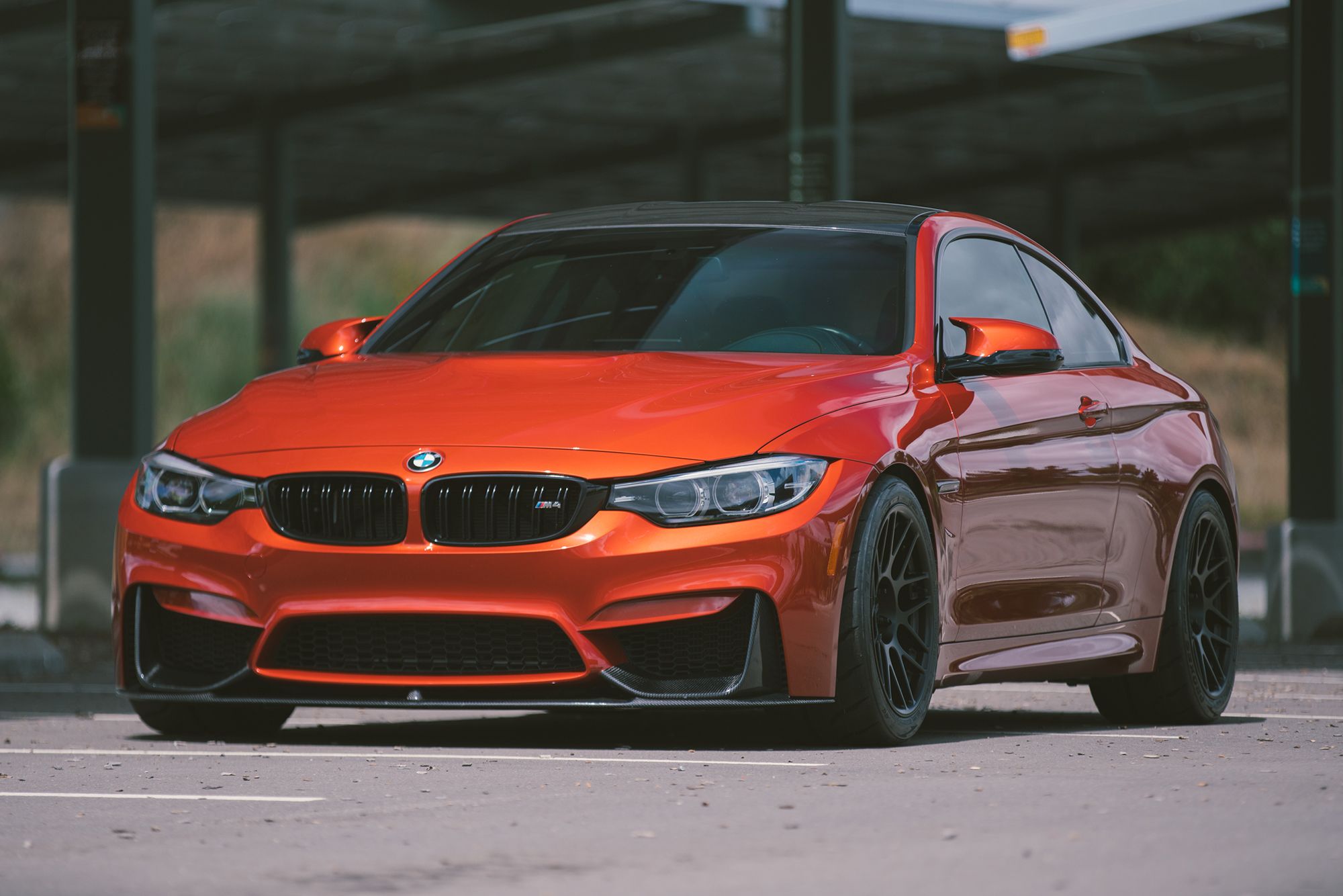 Red BMW F82 Coupe M4 with 18" ARC-8R Apex wheels in Satin Black