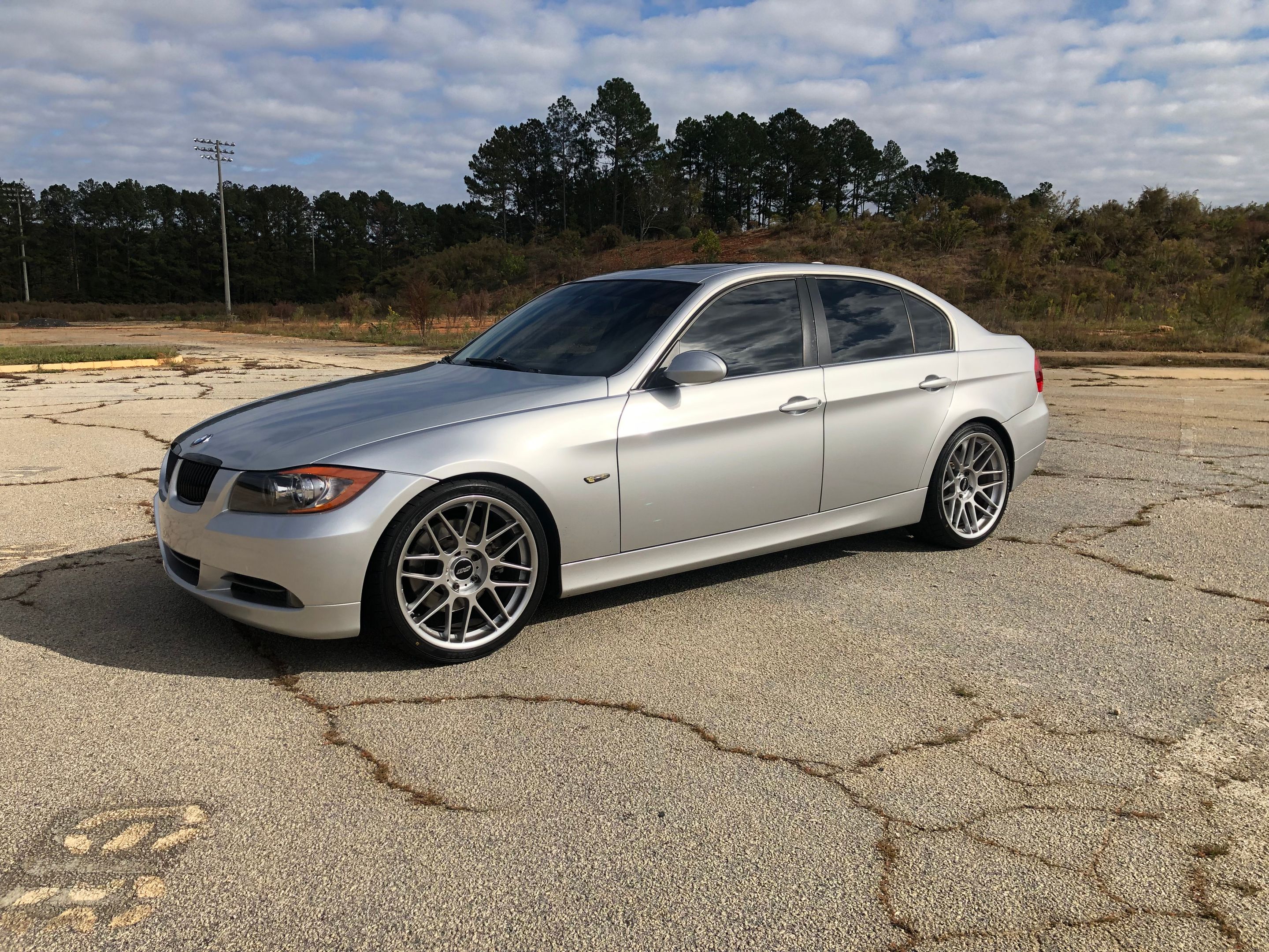 Silver BMW E90 Sedan 3 Series with 19" ARC-8 Apex wheels in Hyper Silver