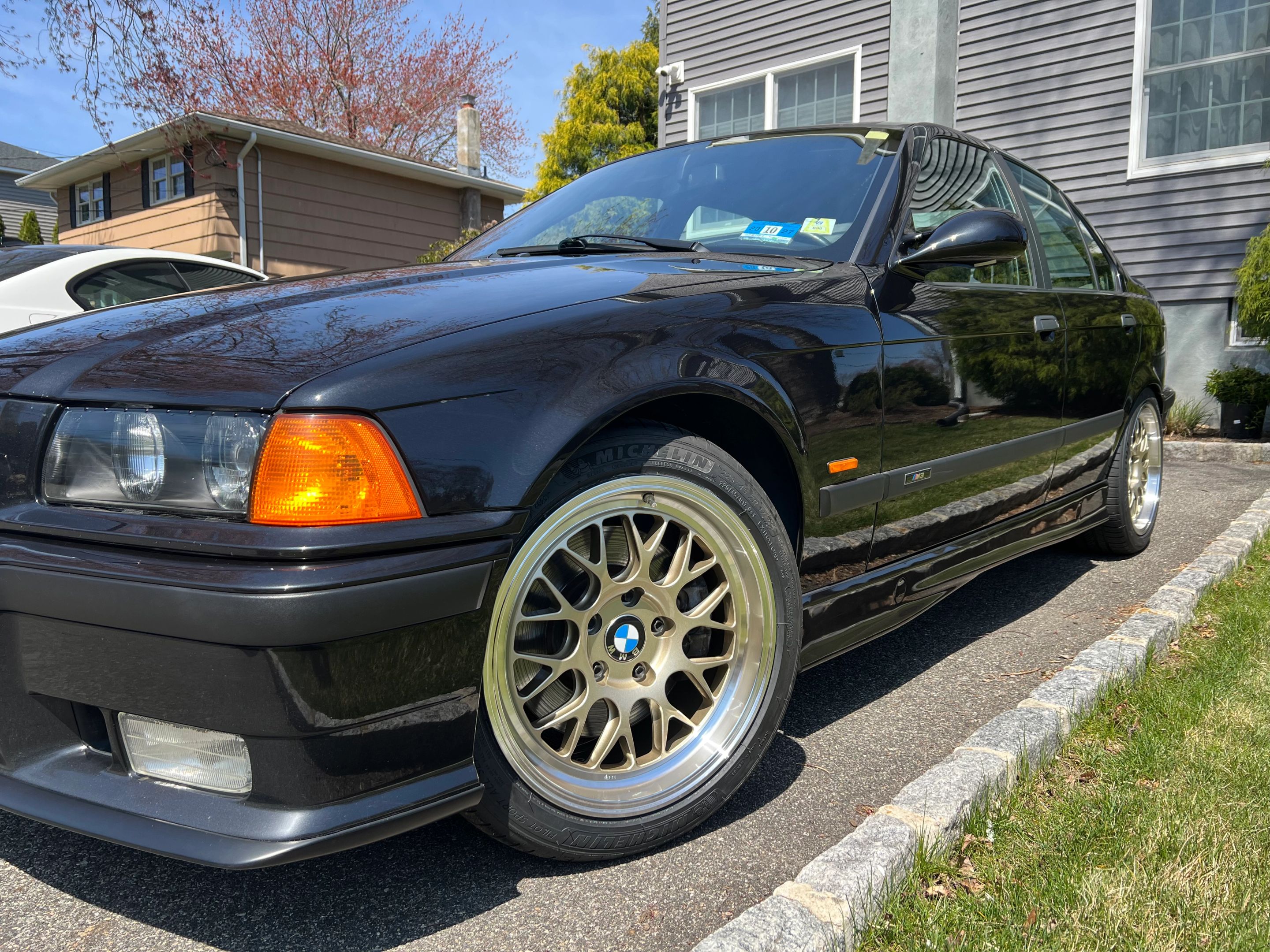 Black BMW E36 M3 with 17" ML-10RT Apex wheels in Machined Lip Gloss Motorsport Gold