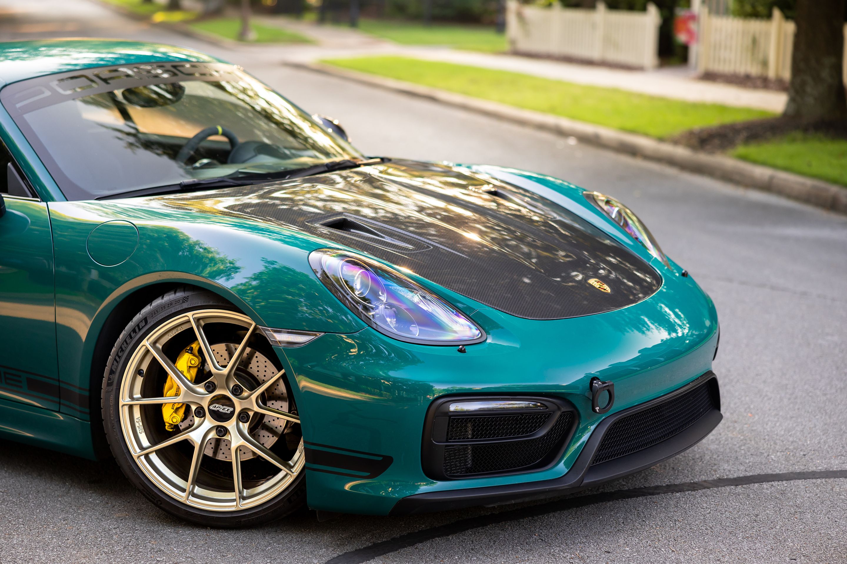 Green Porsche 981 Cayman GTS with 20" VS-5RS Apex wheels in Motorsport Gold