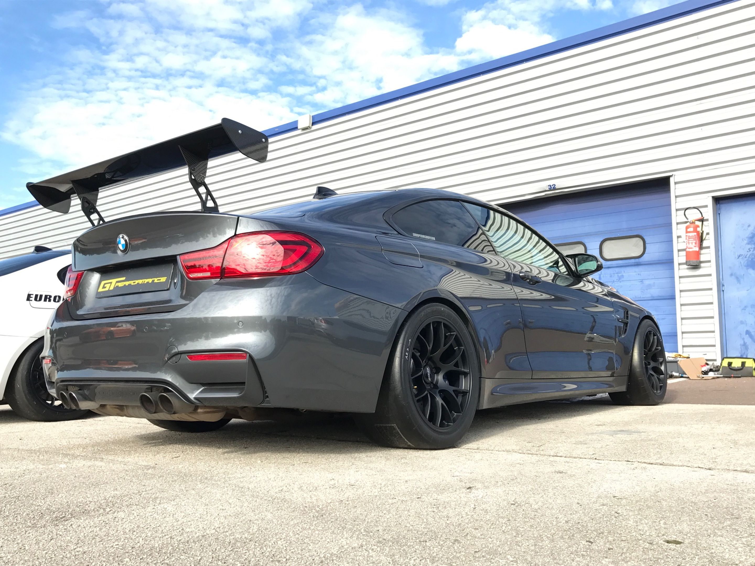 Grey BMW F82 Coupe M4 with 18" EC-7 Apex wheels in Satin Black