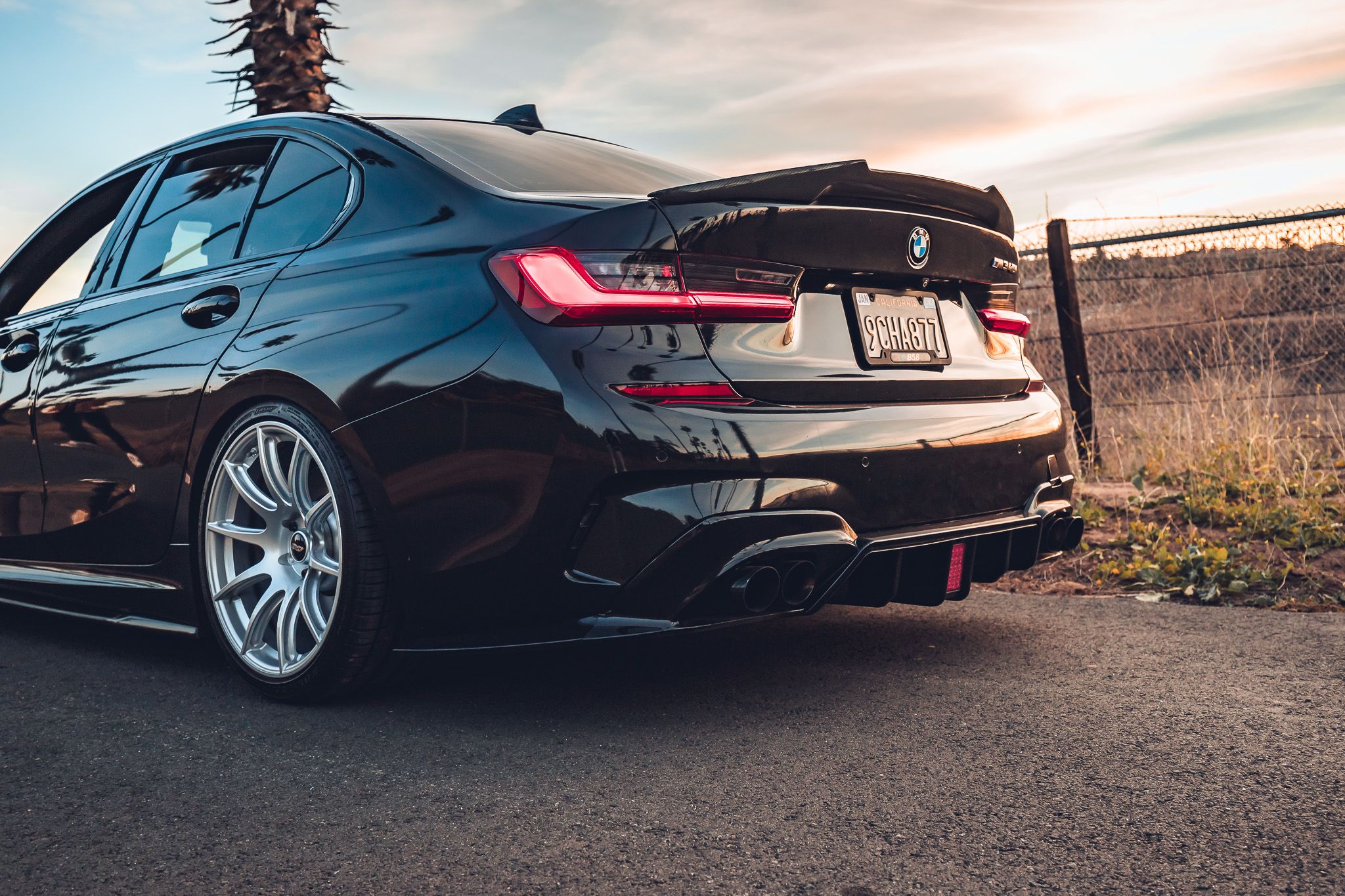Black BMW G20 Sedan 3 Series with 19" SM-10 Apex wheels in Race Silver