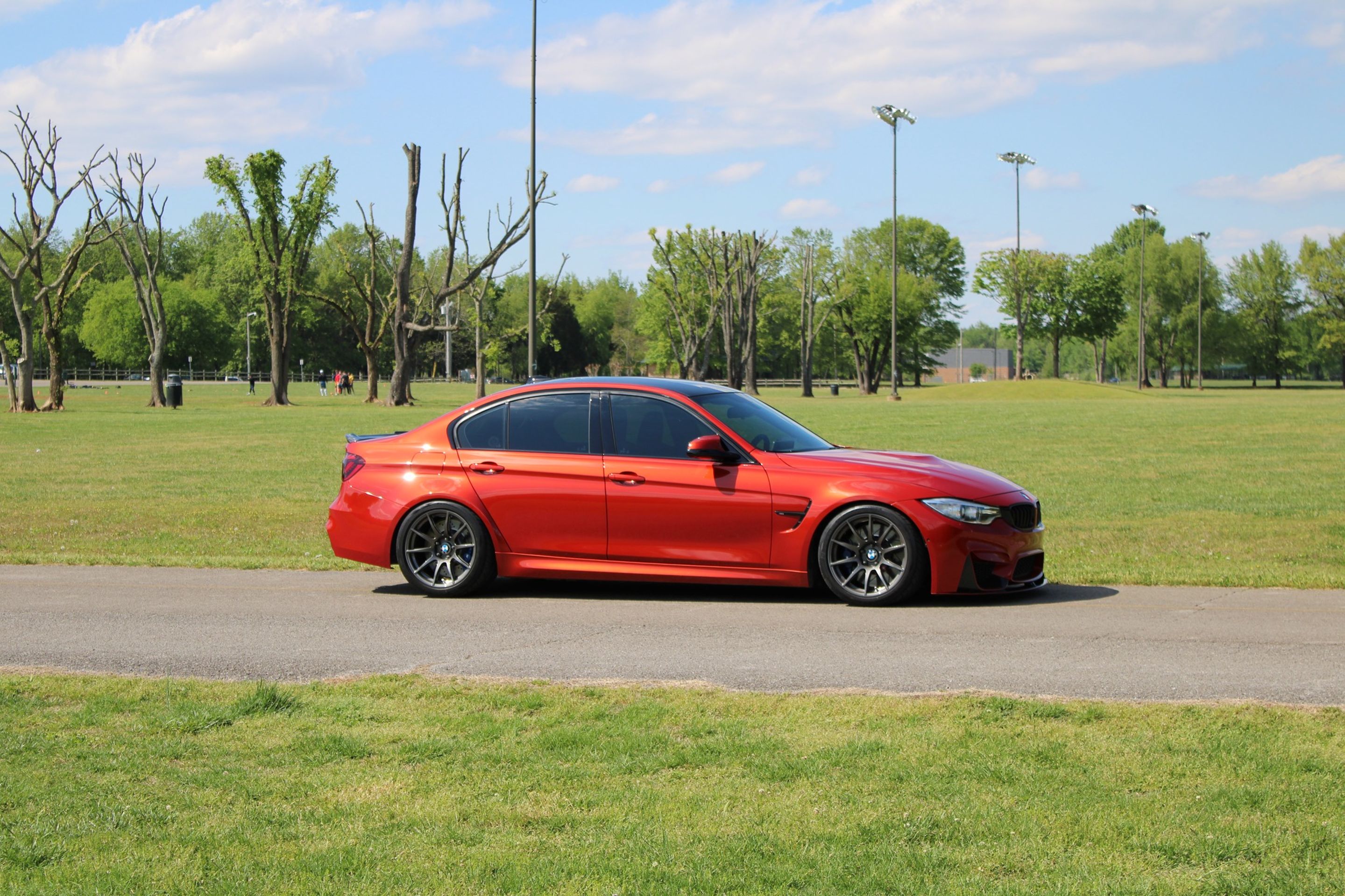 Orange BMW F80 M3 with 18" SM-10 Apex wheels in Anthracite