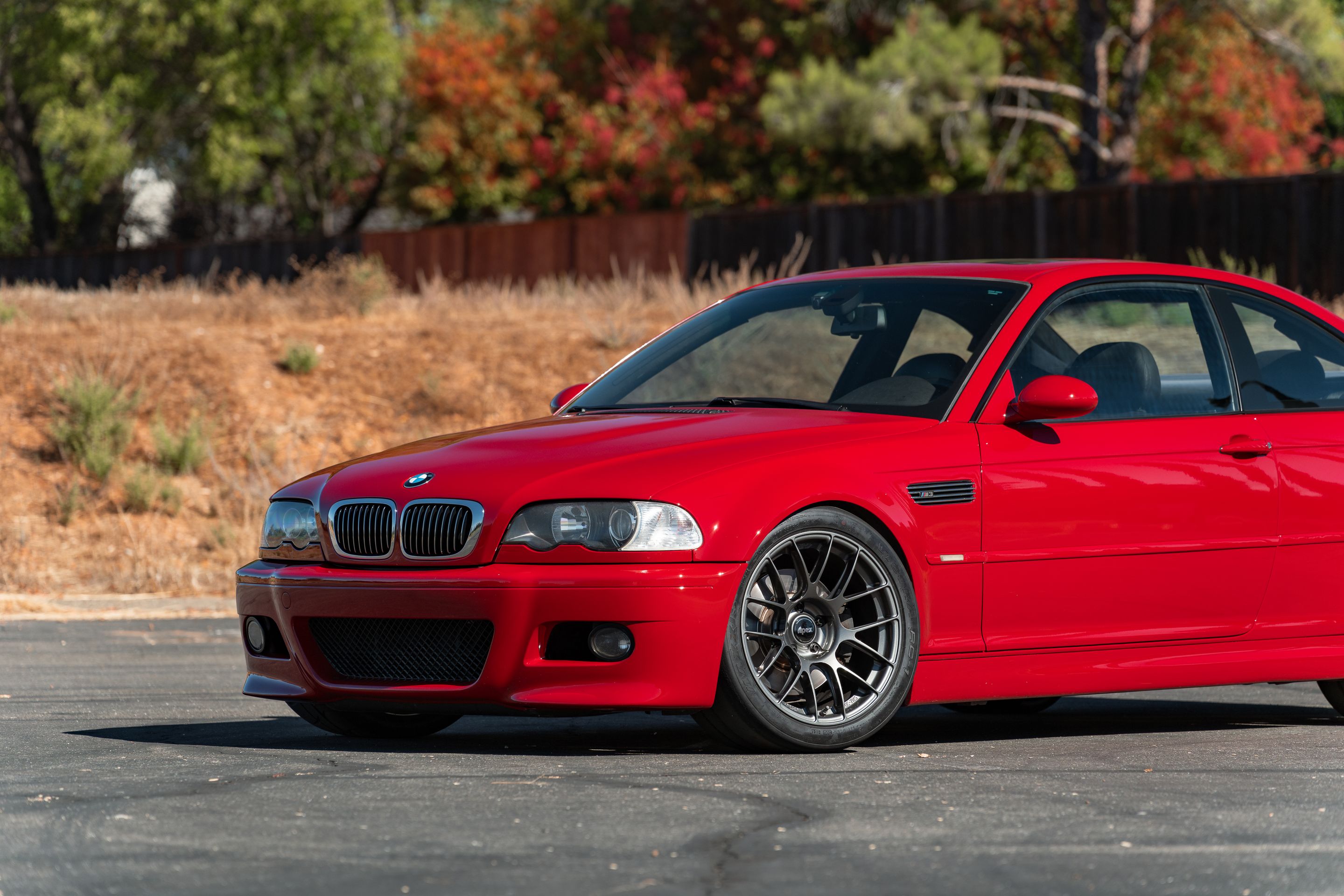 Red BMW E46 M3 with 18" EC-7RS Apex wheels in Anthracite