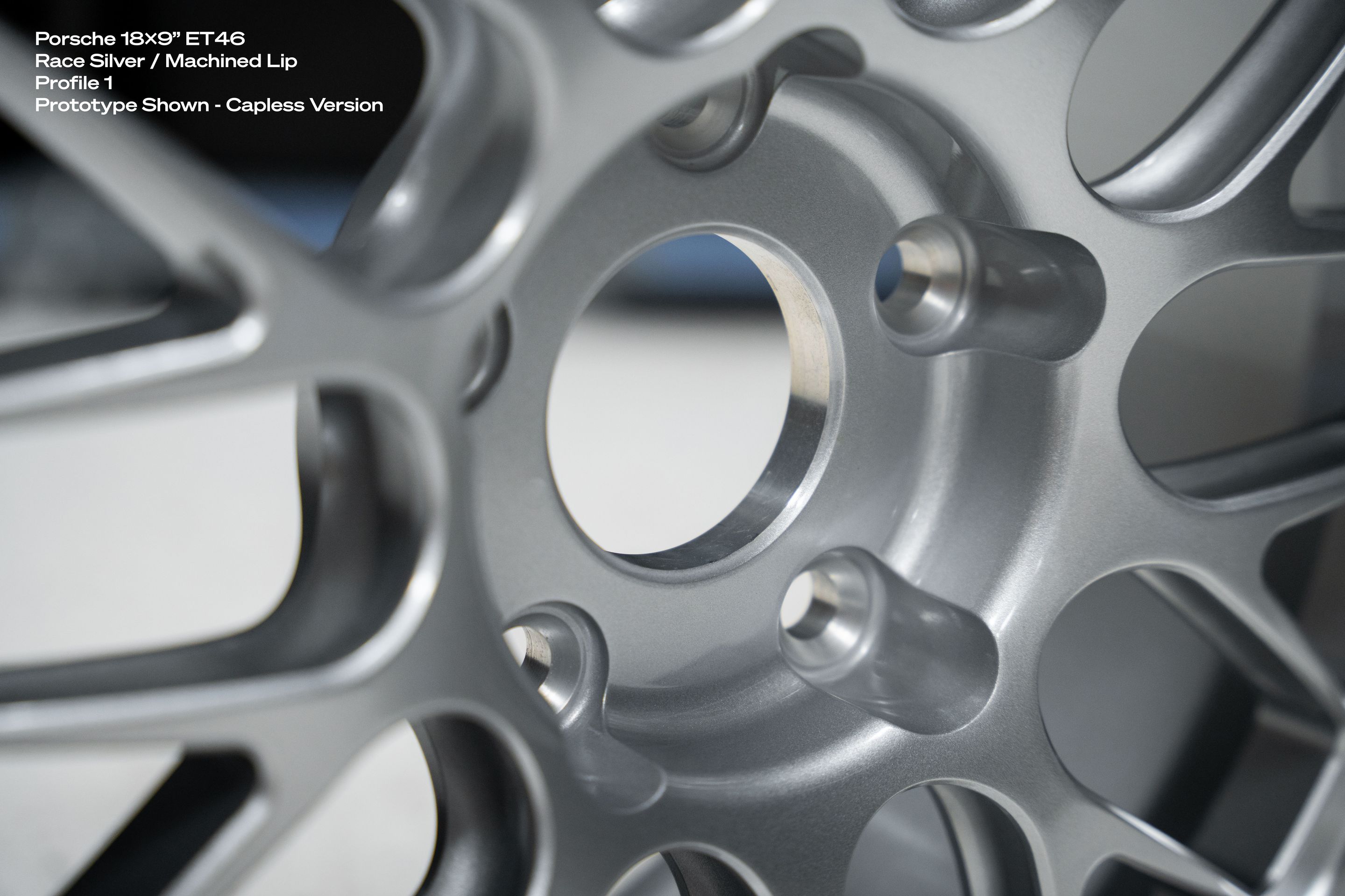 White Porsche 987 Cayman S with 18" ML-10RT Apex wheels in Race Silver