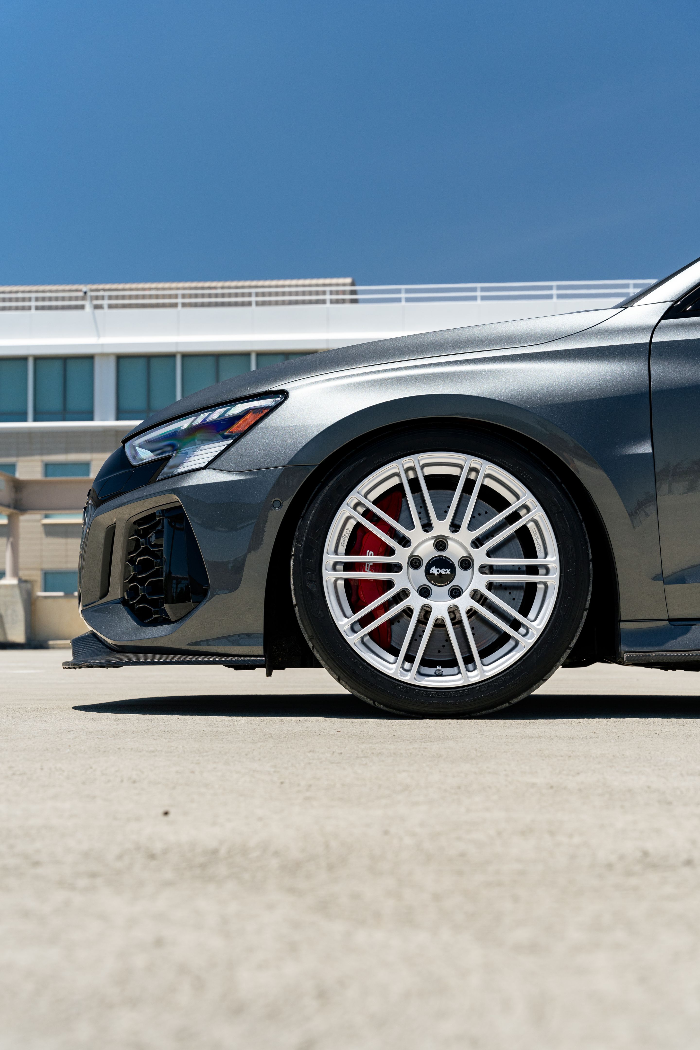 Grey Audi 8Y RS 3 with 18" TC-10RT Apex wheels in Race Silver