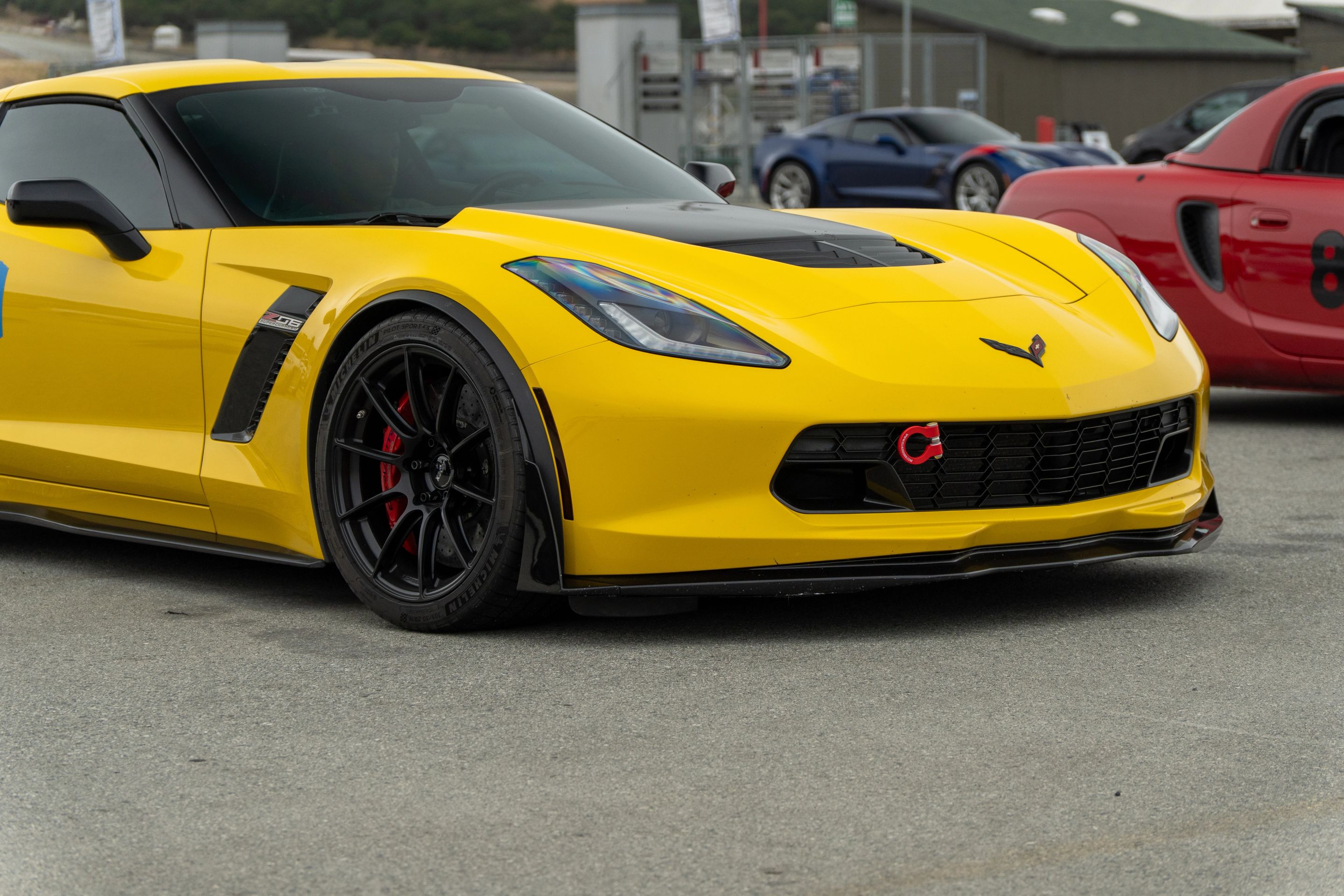 Yellow Chevrolet C7 Corvette Z06 with 19" SM-10RS Apex wheels in Satin Black