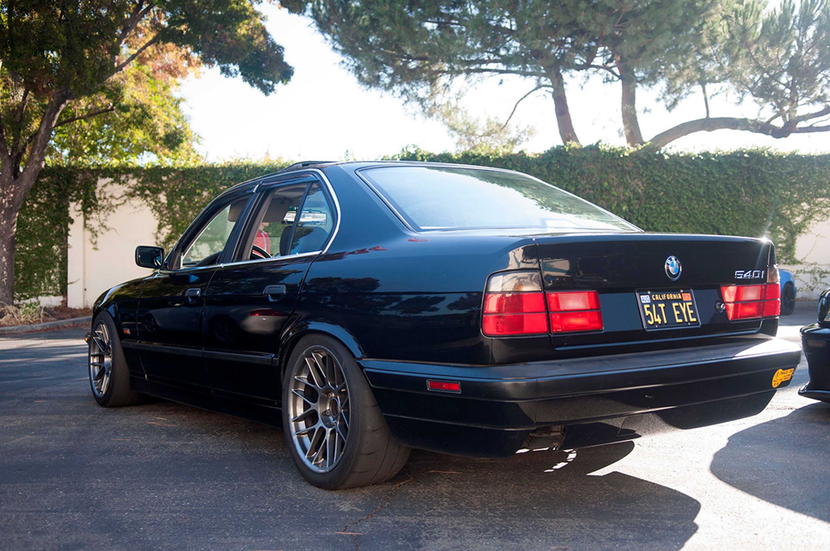 Black Chevrolet 6th Gen Camaro SS with 19" ARC-8 Apex wheels in Satin Black