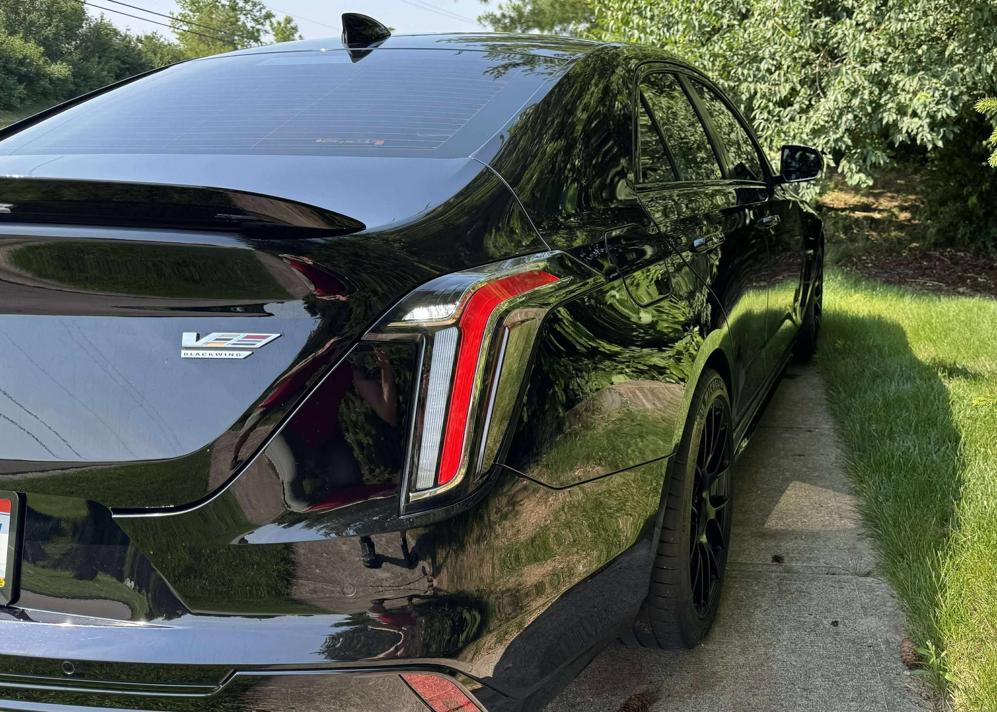 Black Cadillac CT4-V Blackwing with 18" EC-7RS Apex wheels in Satin Black