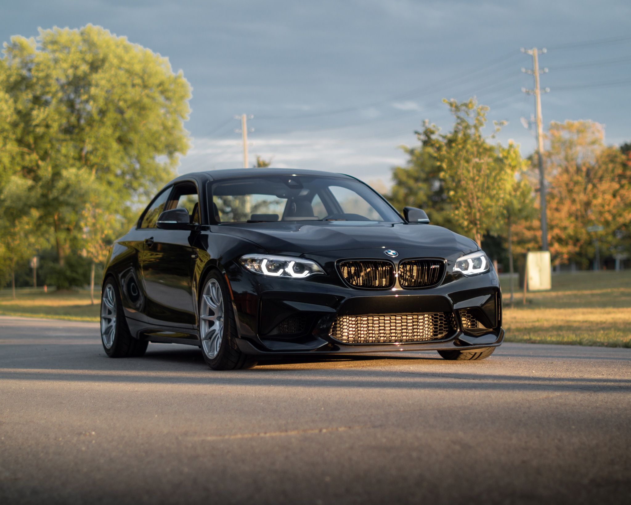 Black BMW F87 M2 with 18" SM-10 Apex wheels in Race Silver
