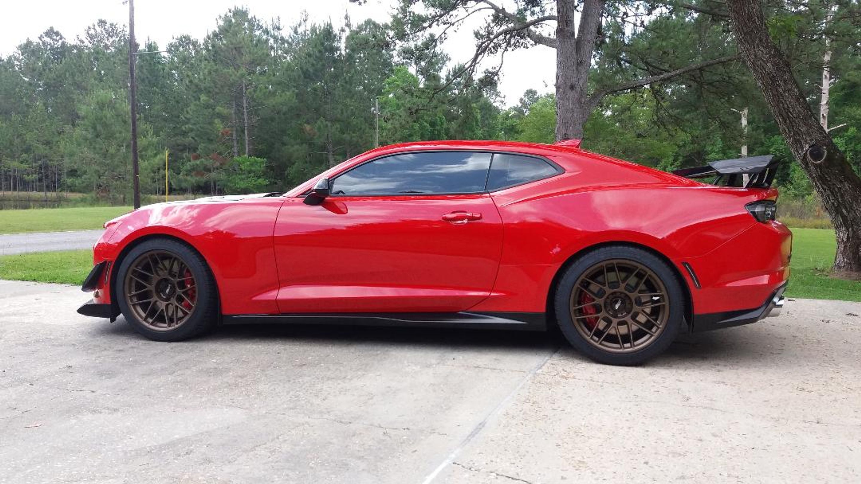 Red Chevrolet 6th Gen Camaro ZL1 1LE with 19" ARC-8 Apex wheels in Satin Bronze