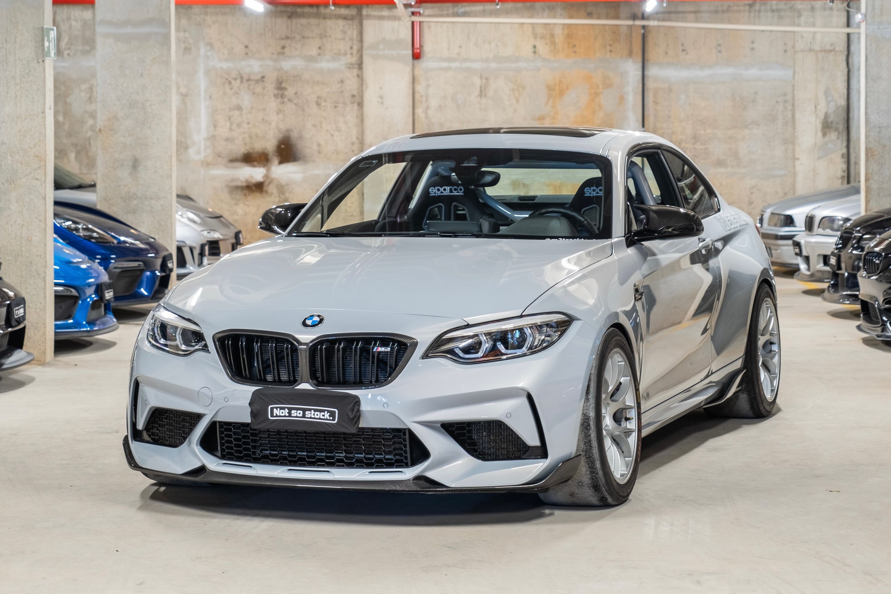 Grey BMW F87 M2 with 18" EC-7 Apex wheels in Race Silver