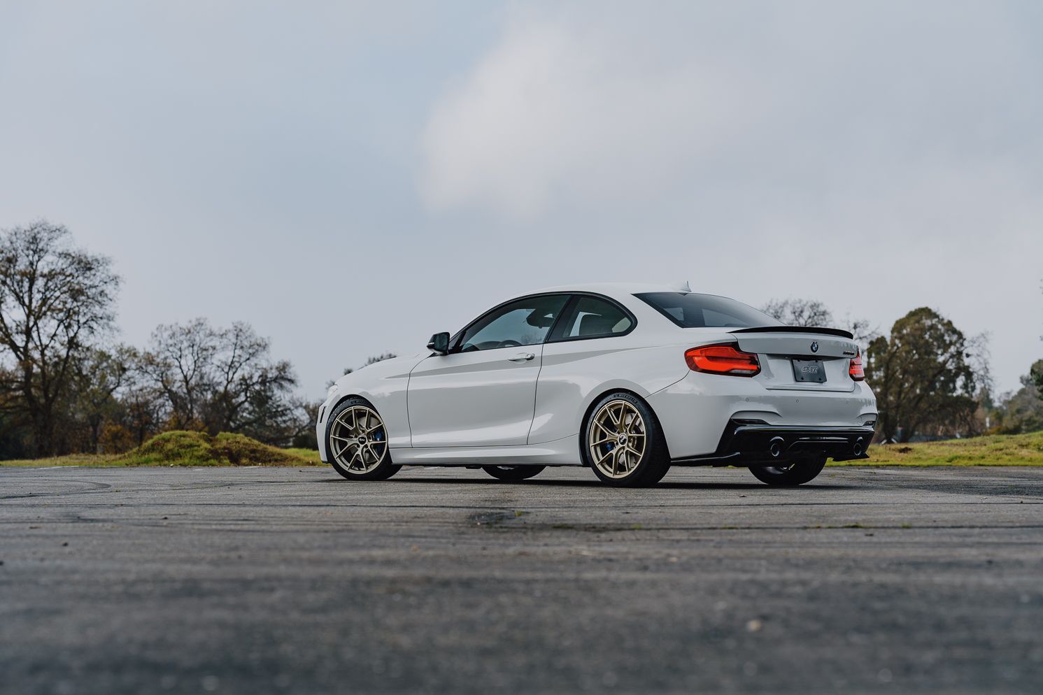 White BMW F22 Coupe 2 Series with 18" VS-5RS Apex wheels in Motorsport Gold